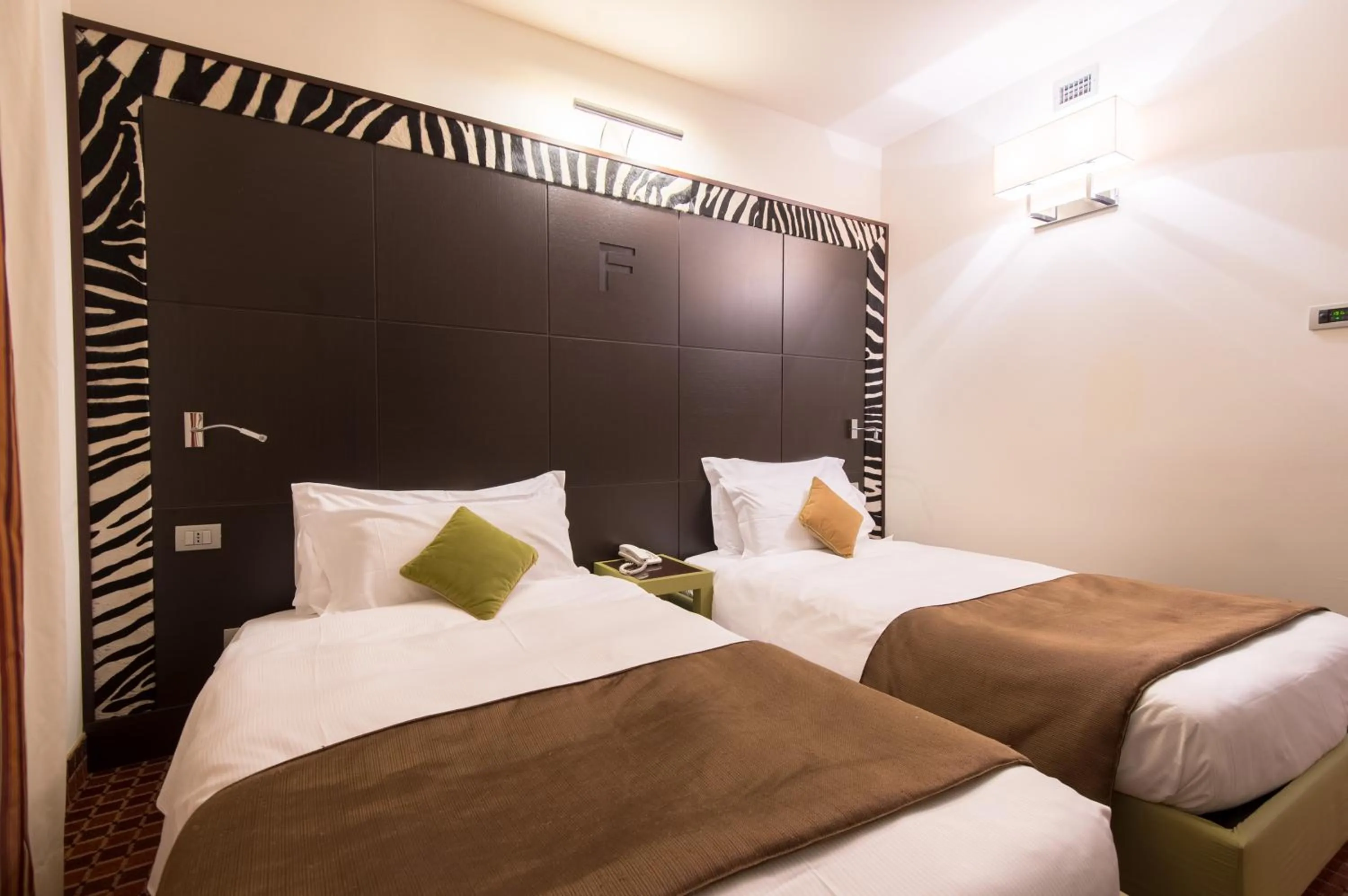 Bed in First Hotel Malpensa