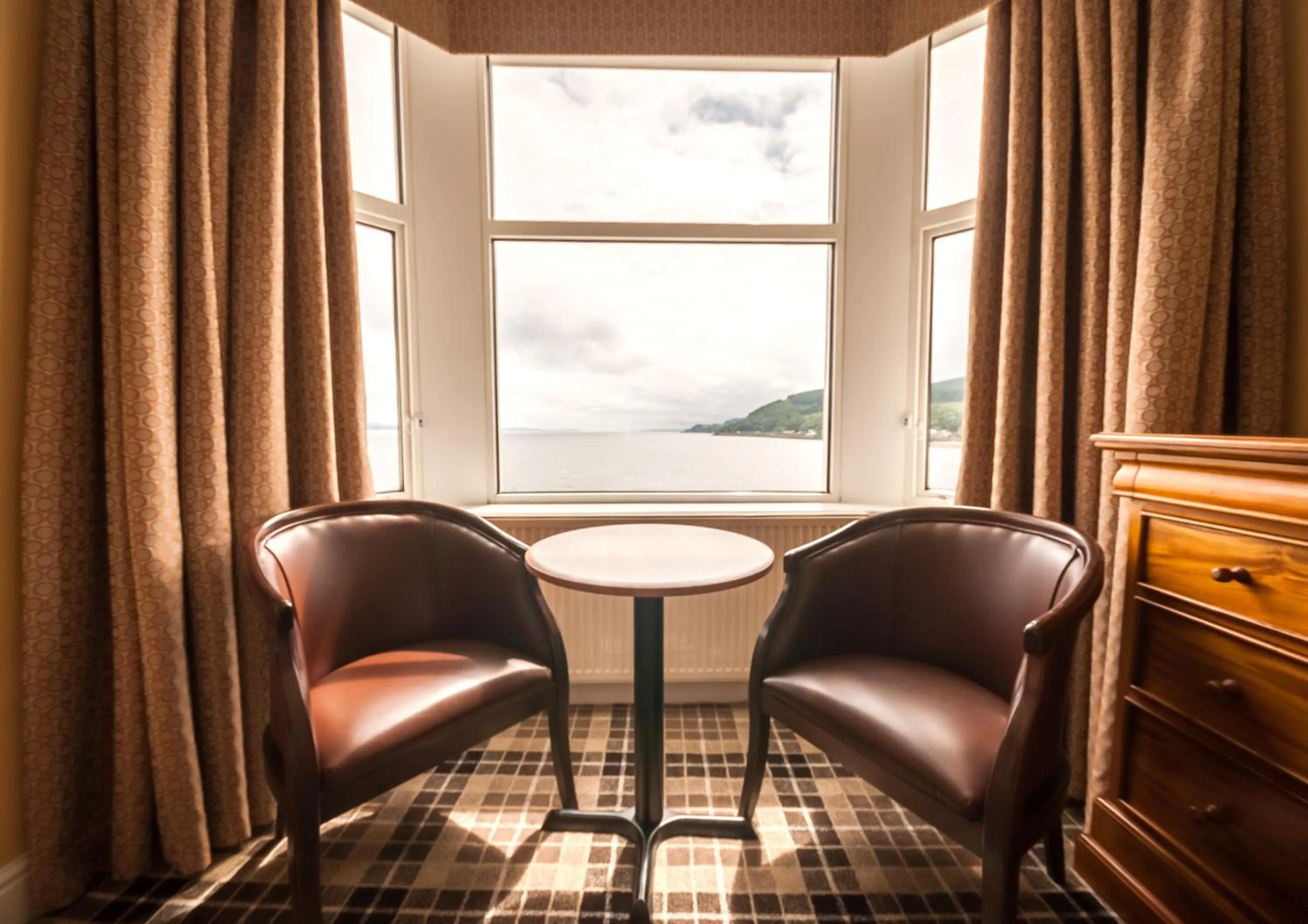 Seating area in SGE Esplanade Hotel