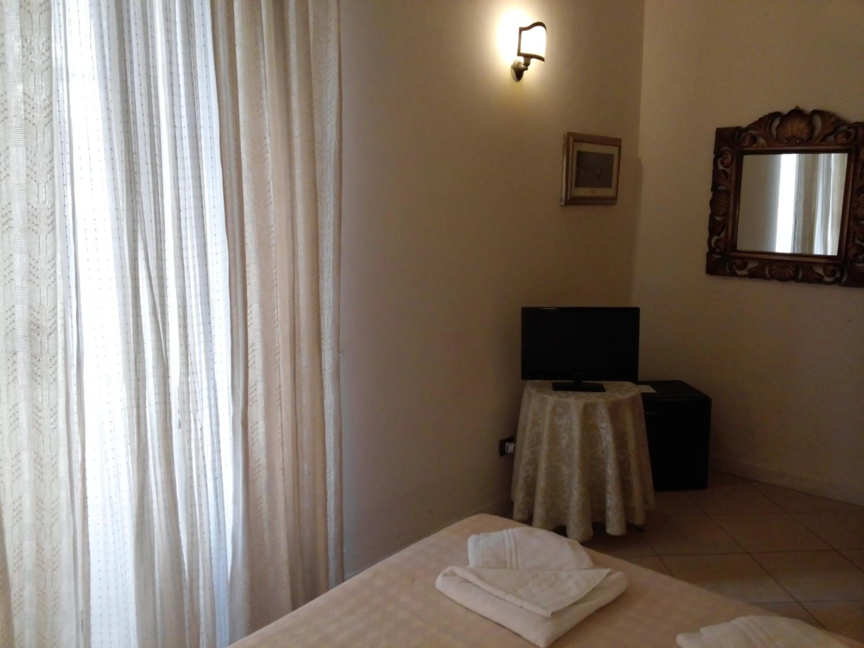 Decorative detail, Bed in Marta Guest House