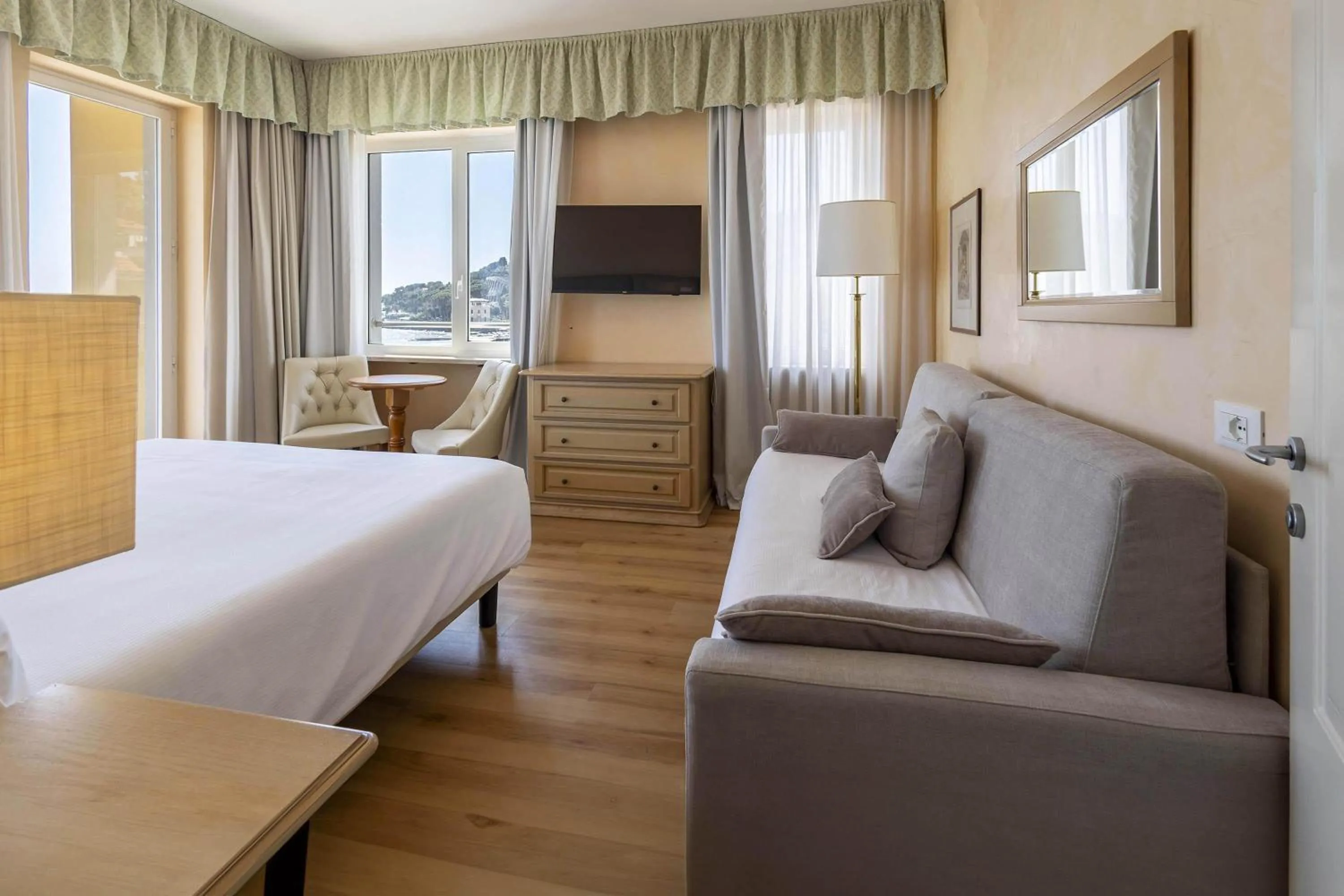 Photo of the whole room, Bed in B&B HOTEL Diano Marina Palace