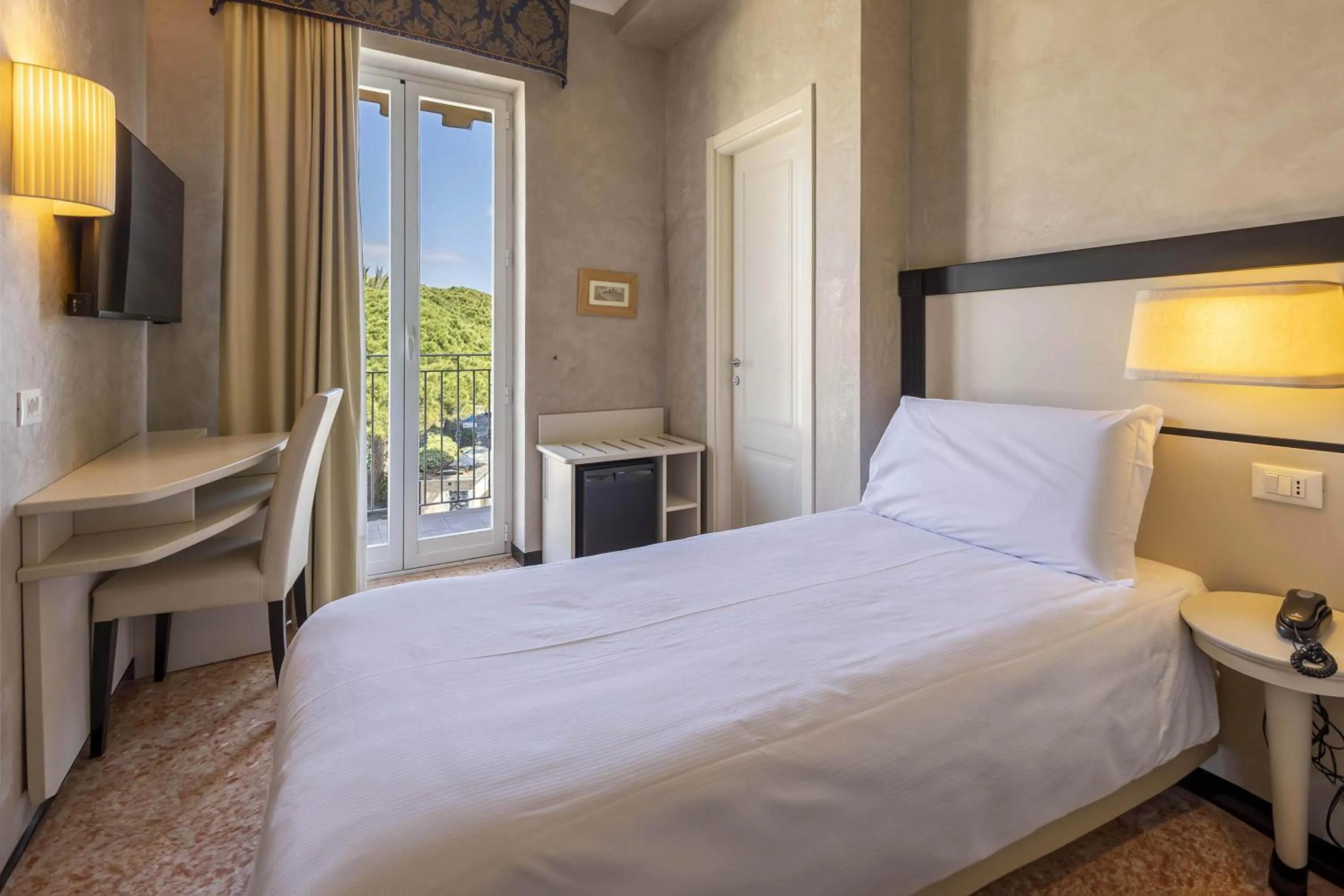 Photo of the whole room, Bed in B&B HOTEL Diano Marina Palace