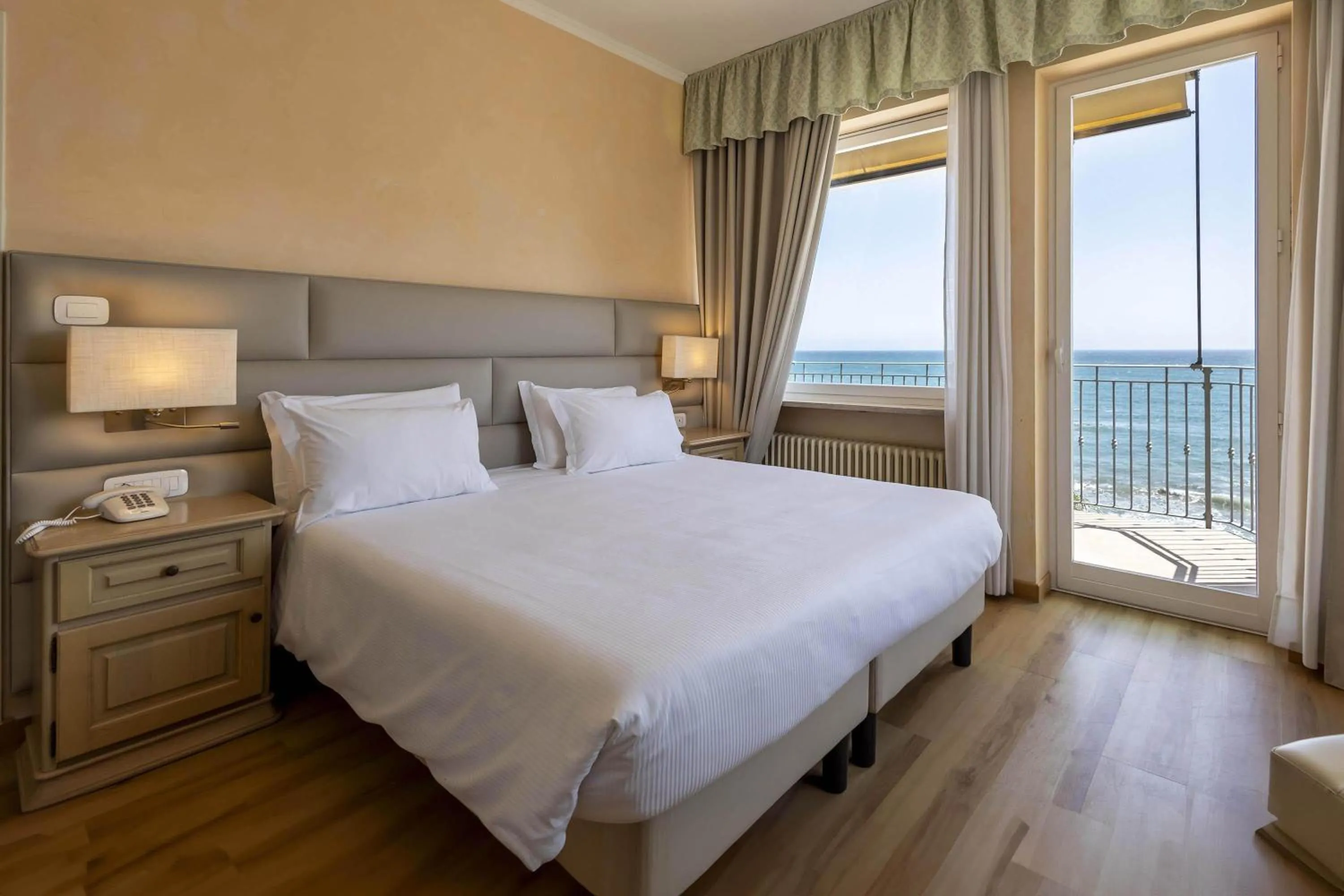 Photo of the whole room, Bed in B&B HOTEL Diano Marina Palace