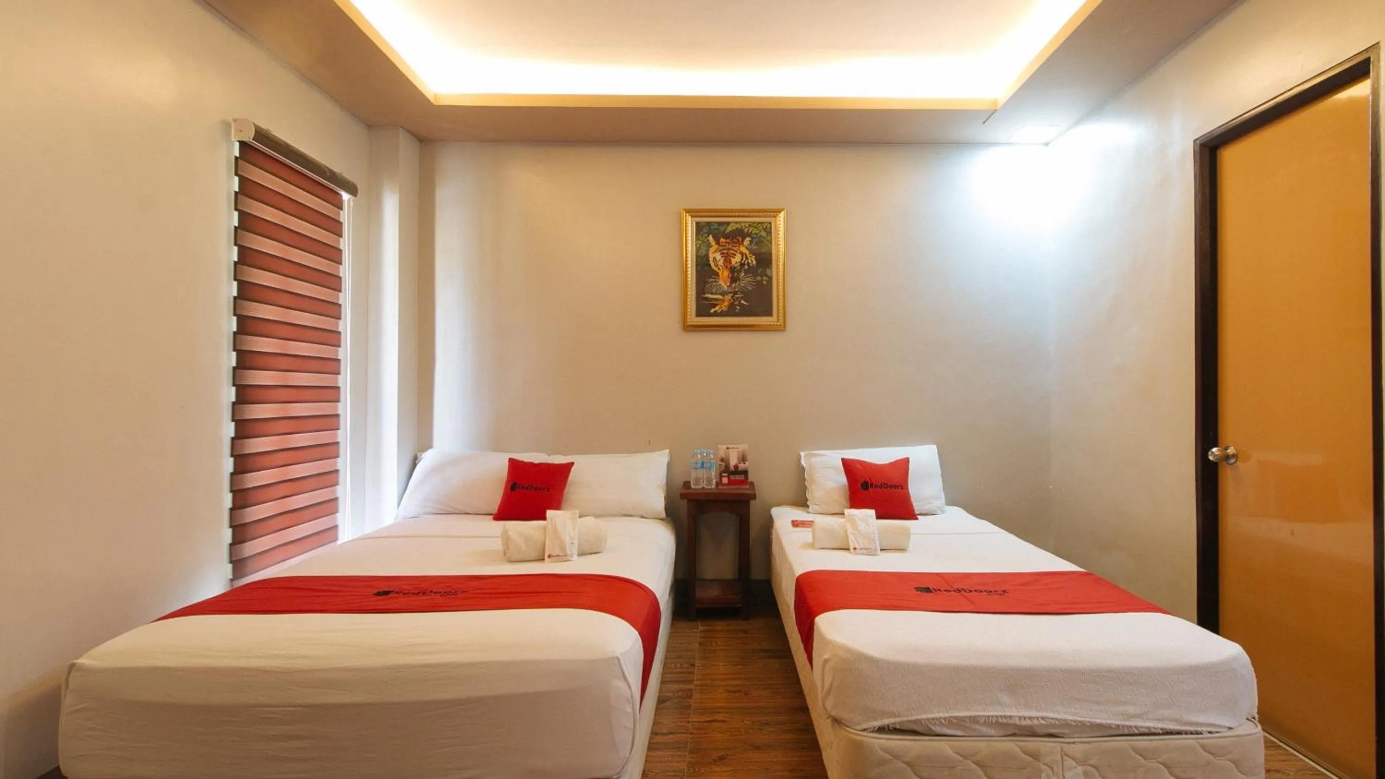 Bed in RedDoorz @ Afamosa Villas Resort Ilocos Sur