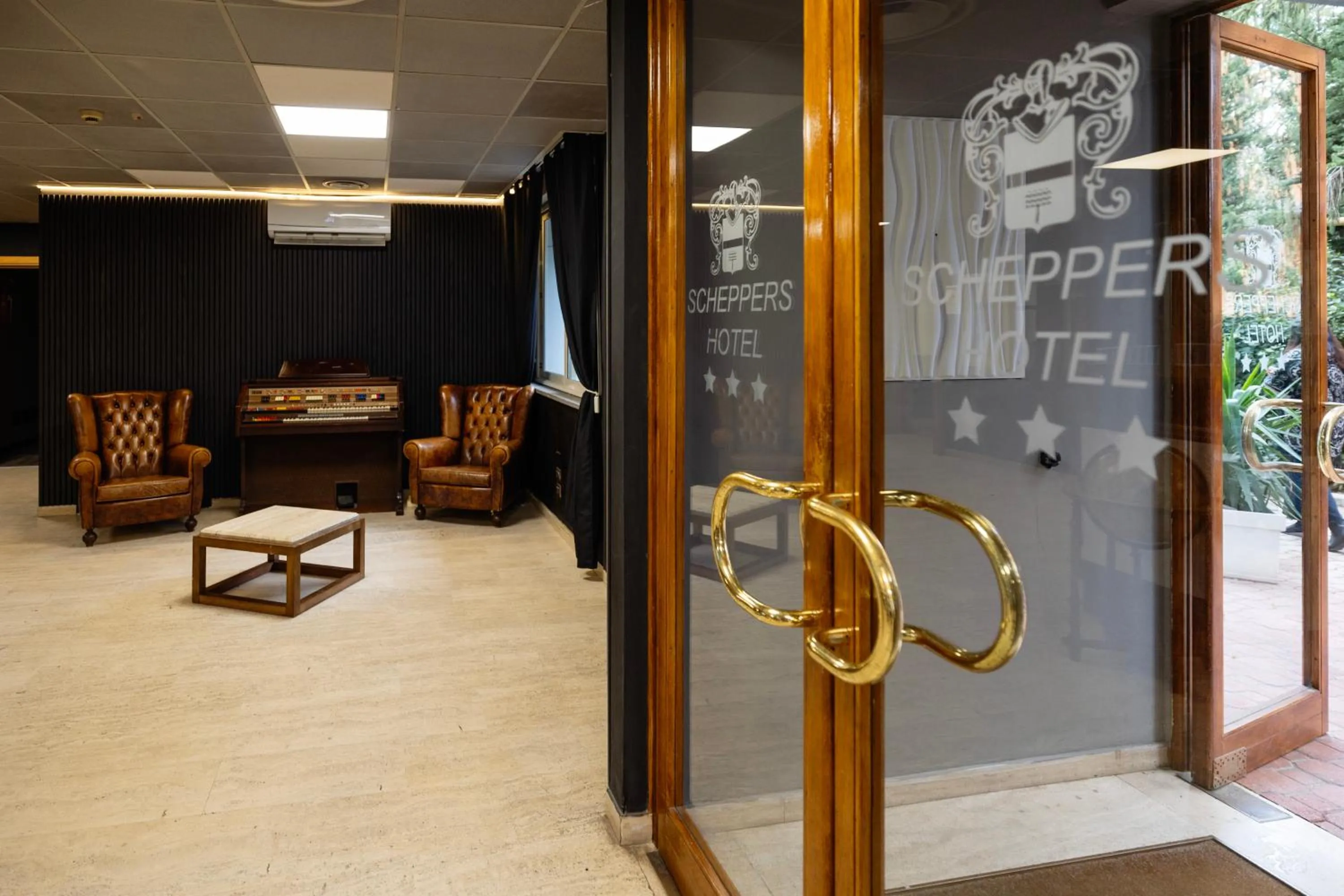 Lobby or reception in Scheppers Hotel