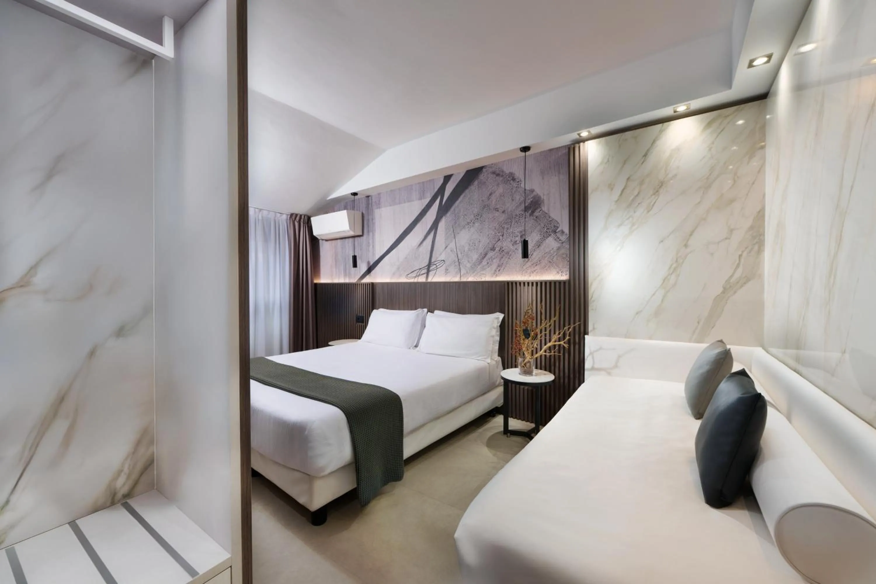 Bed in Hotel Metropolitan