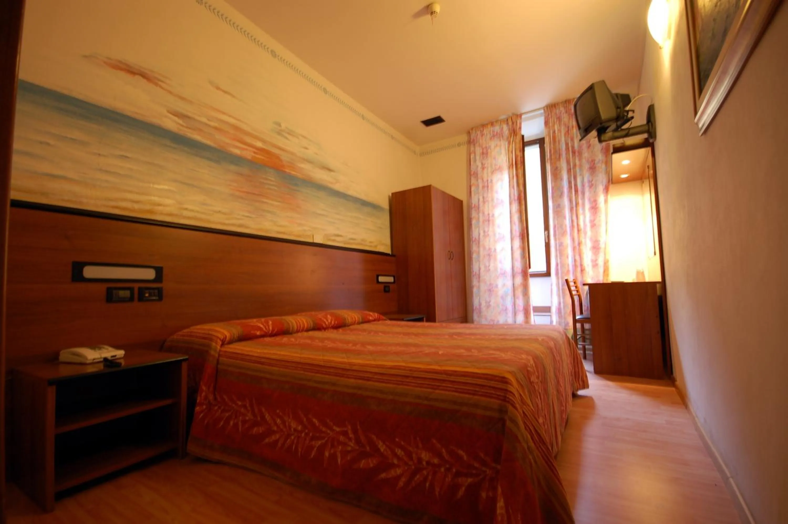 Bed in Hotel Leonardo