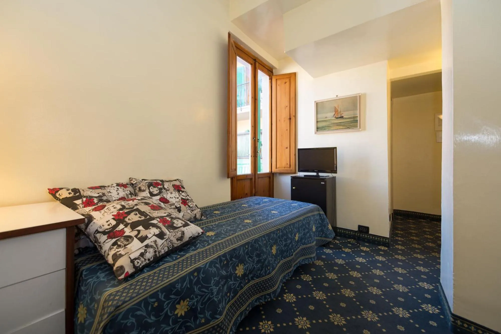 Bed in Hotel Corallo