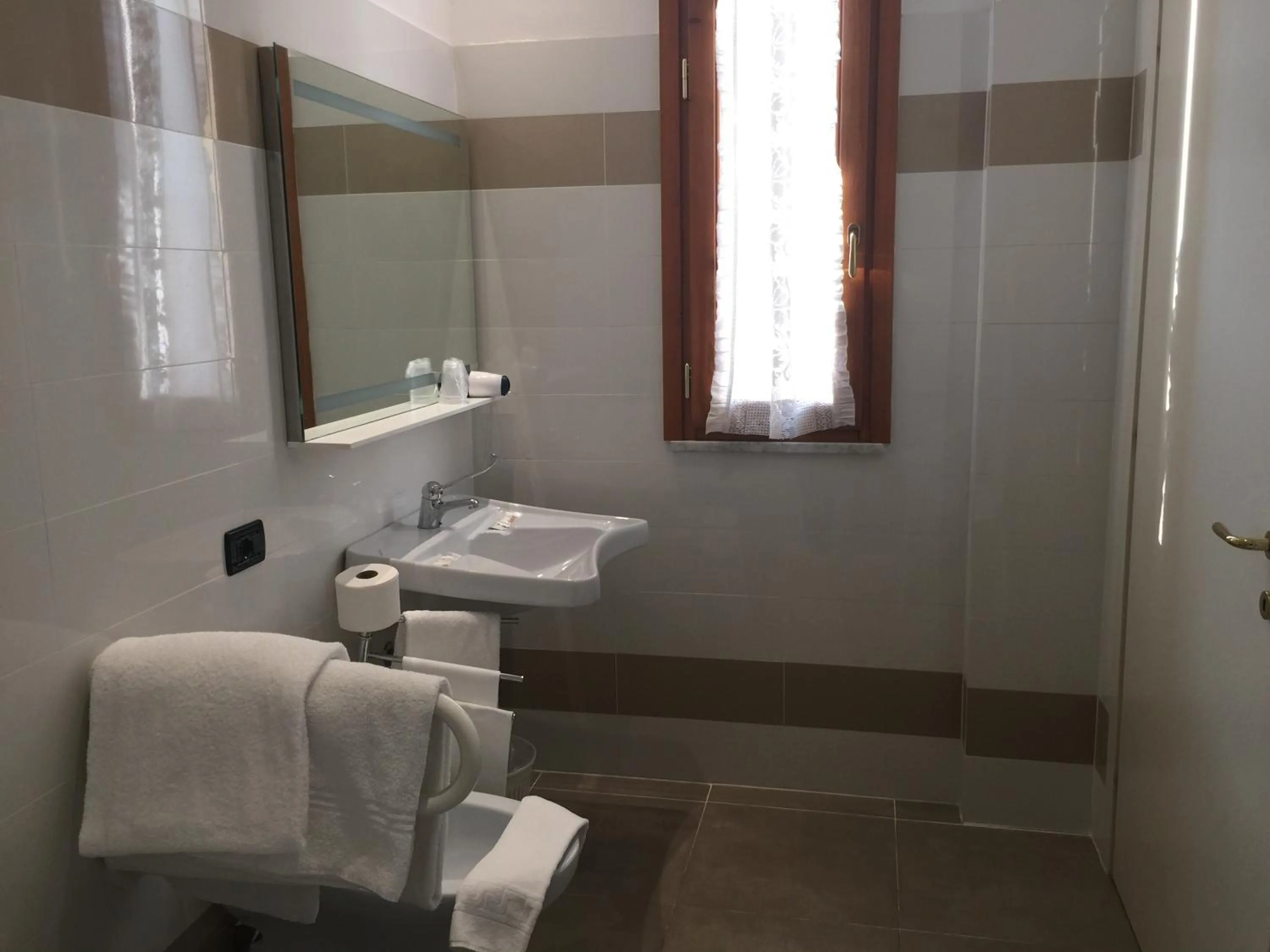 Bathroom in Hotel Corallo