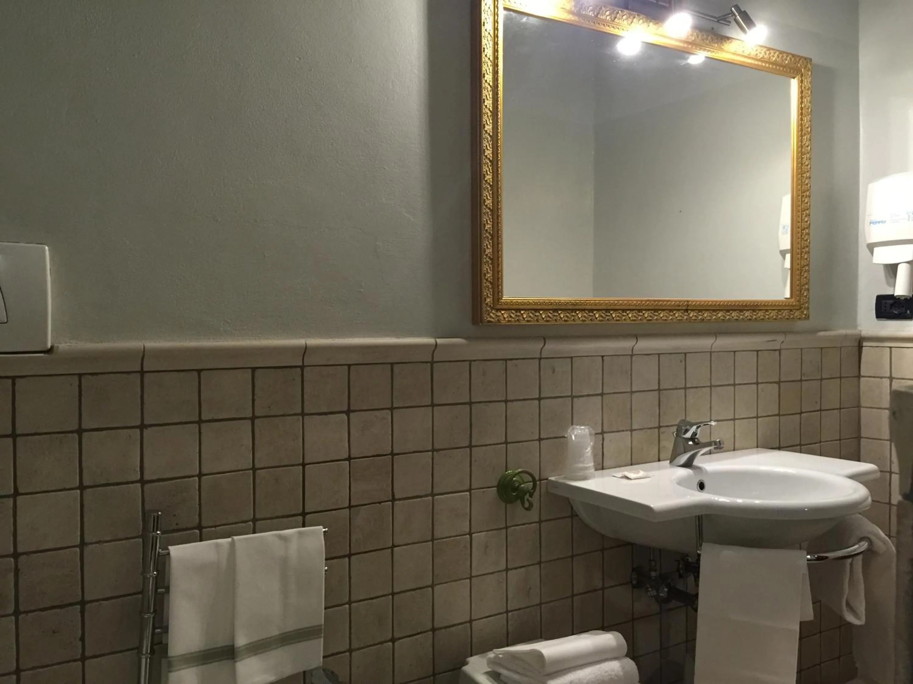 Bathroom in Hotel Corallo