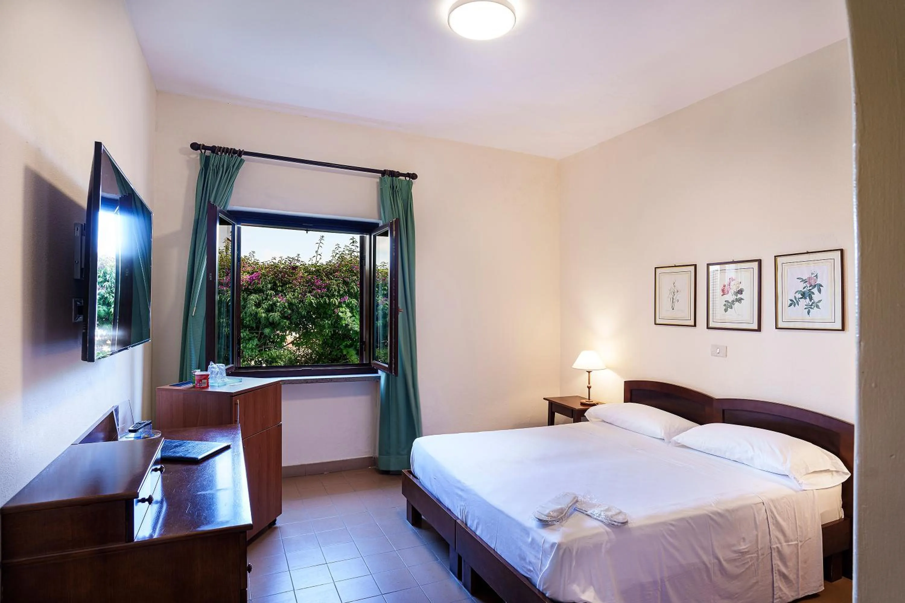 Bed in Hotel Le Dune