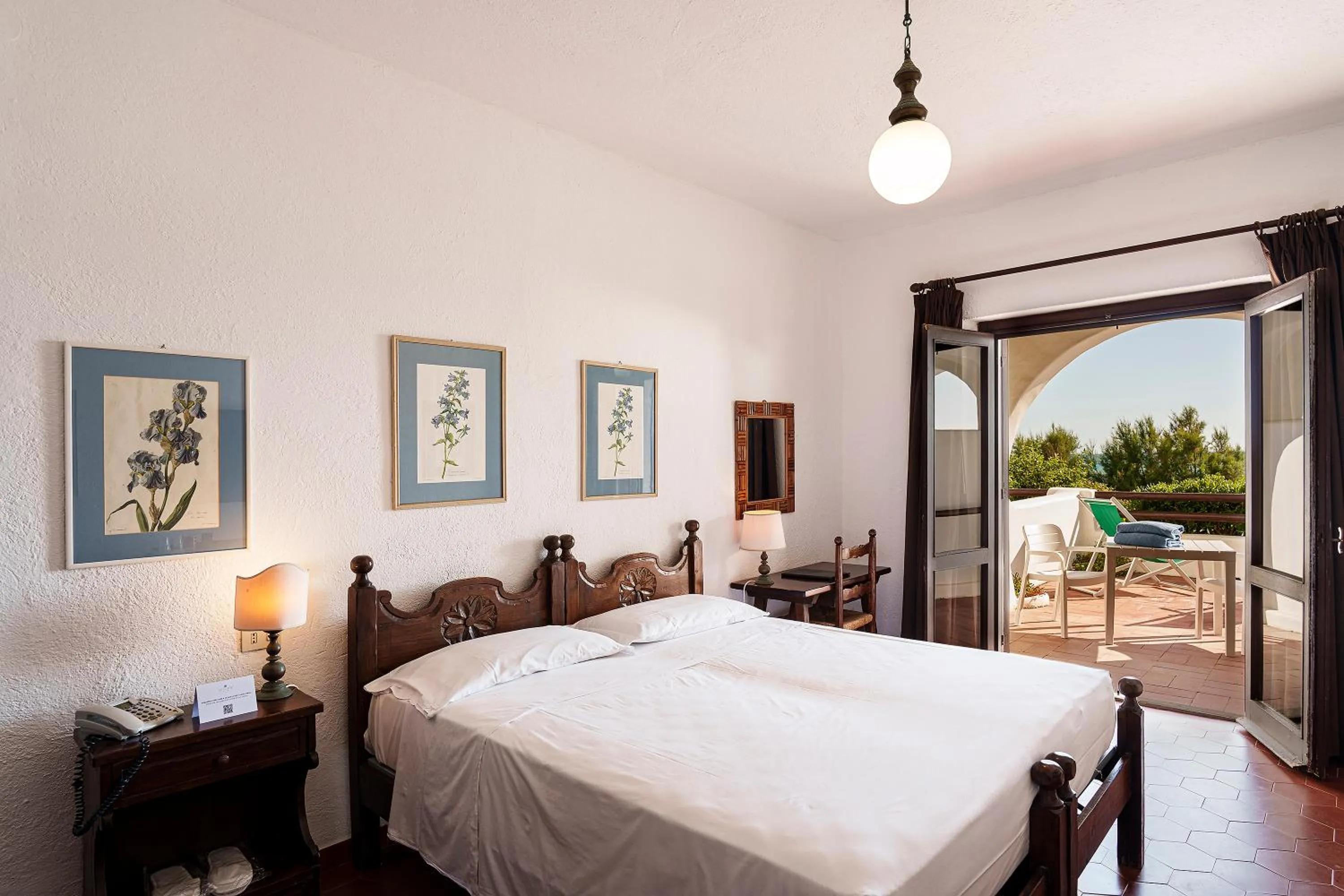 Bed in Hotel Le Dune