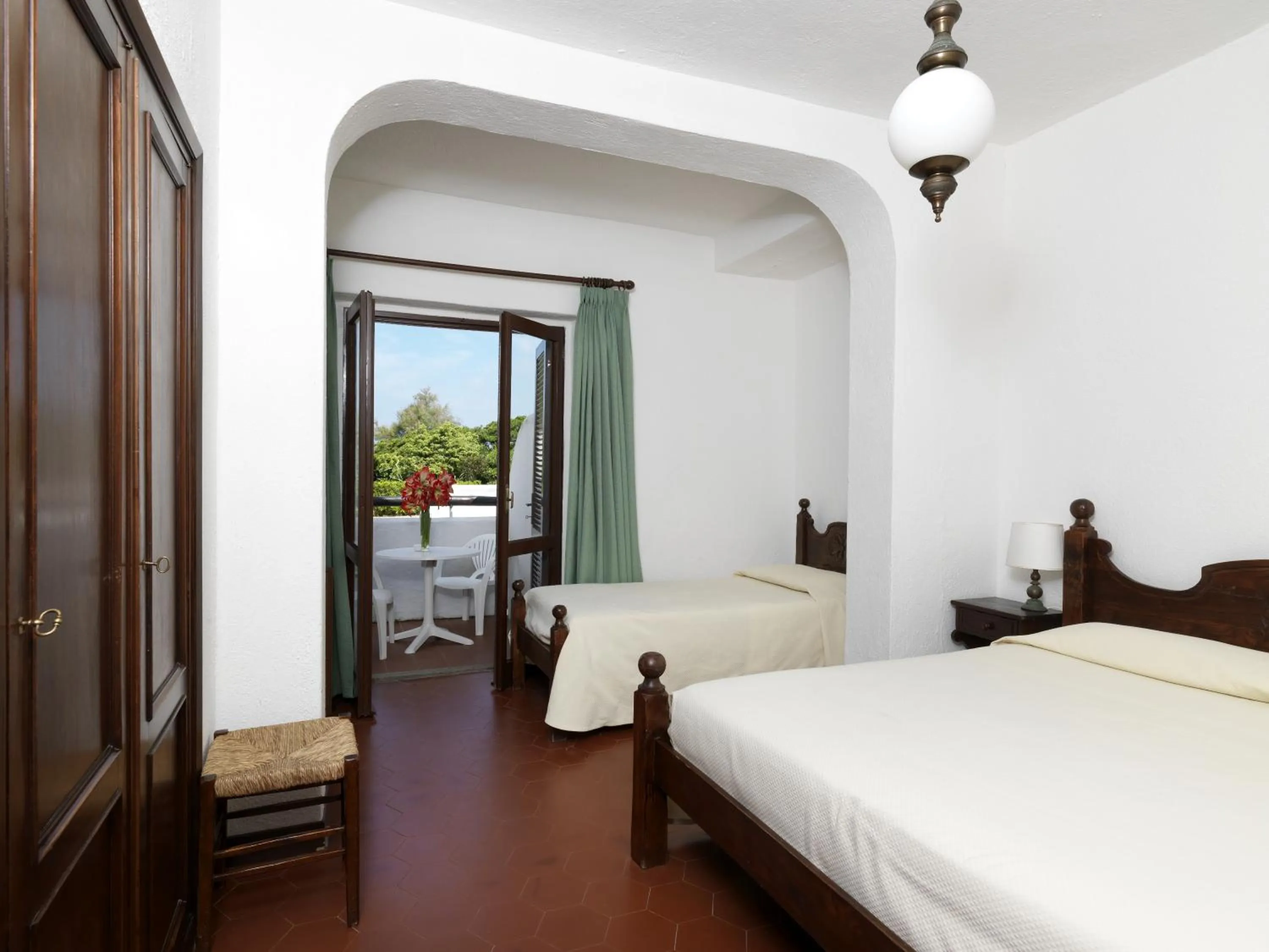 Bed in Hotel Le Dune