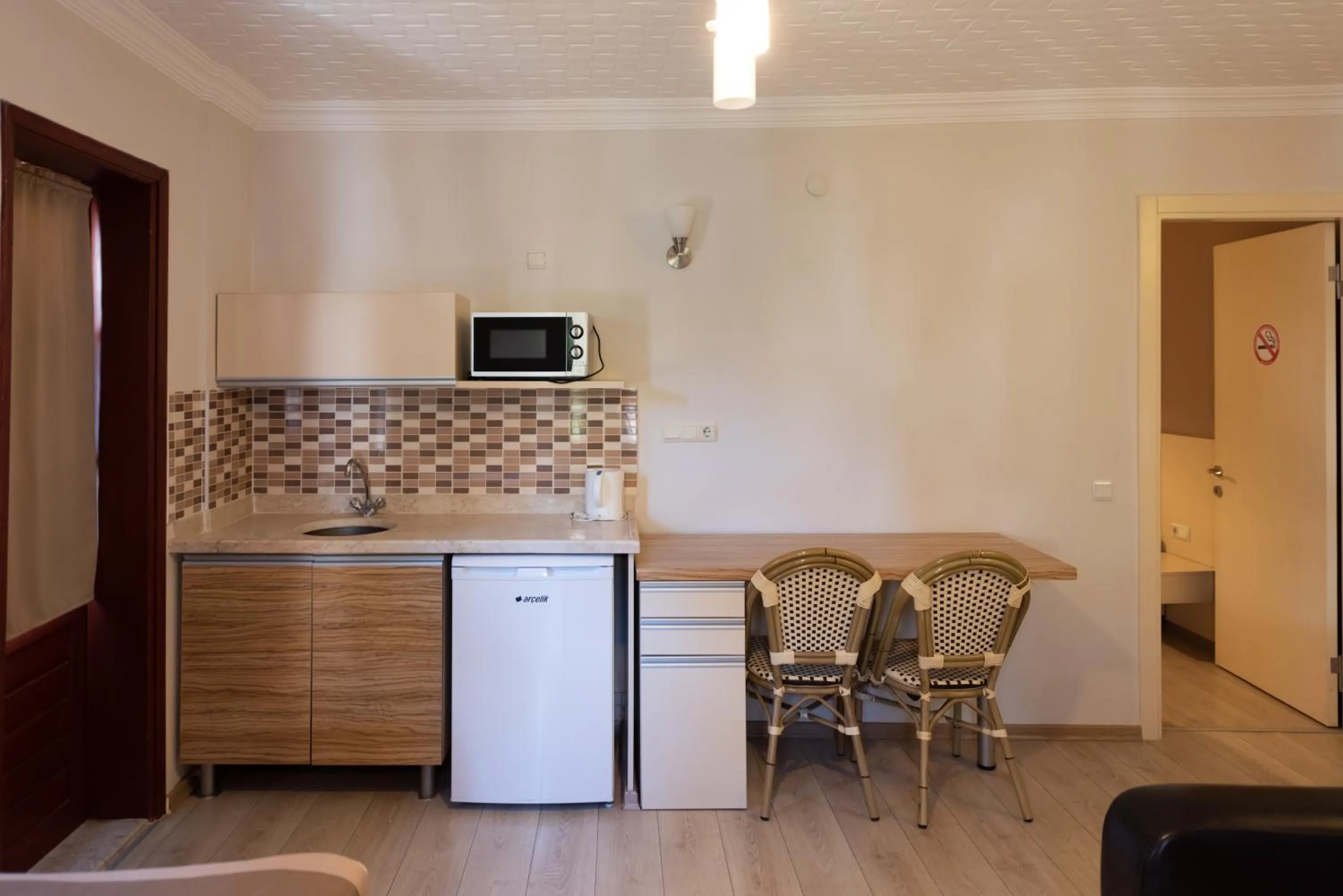 Kitchen or kitchenette in Vira Suites Hotel