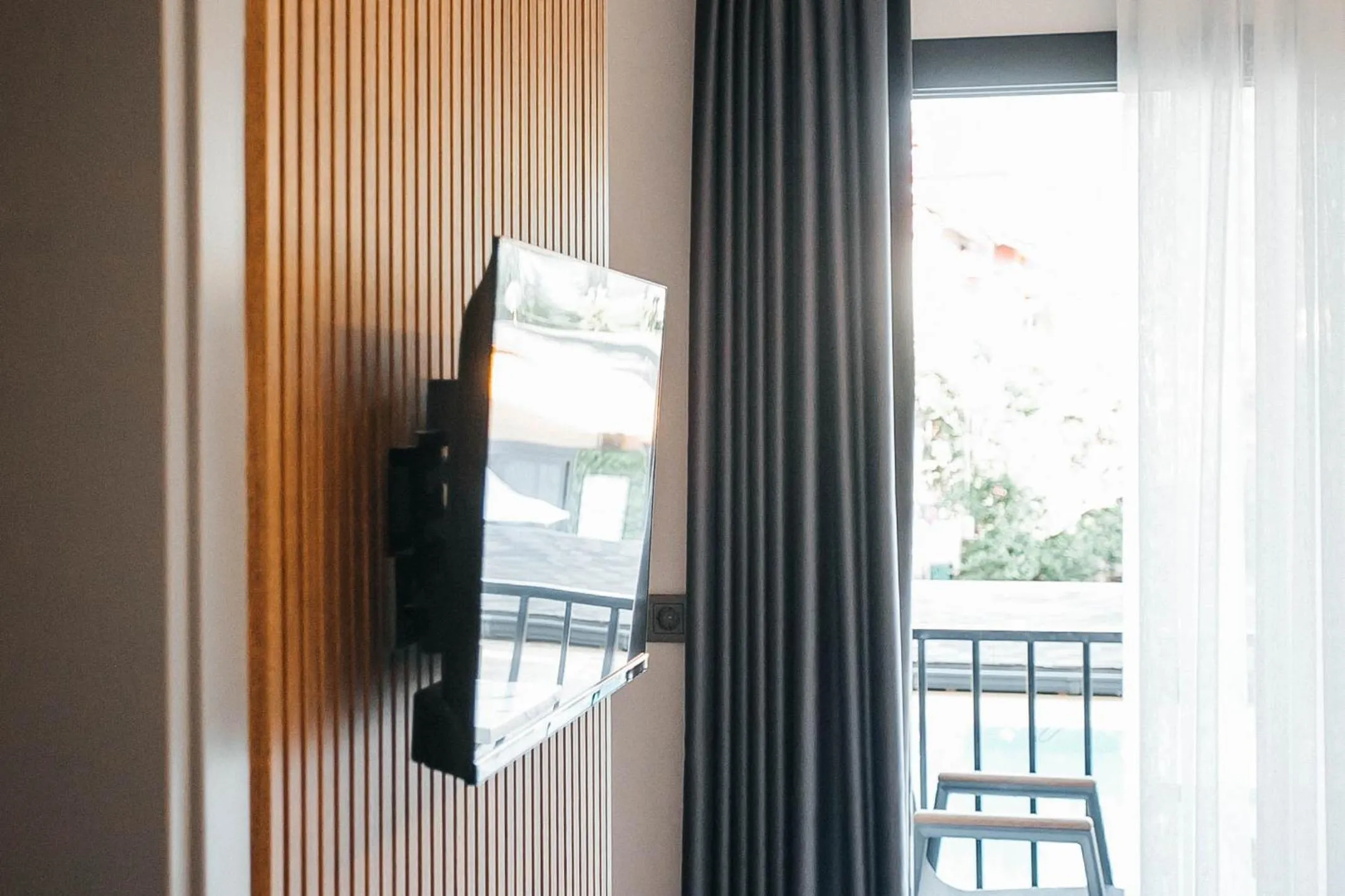 TV and multimedia in Vira Suites Hotel