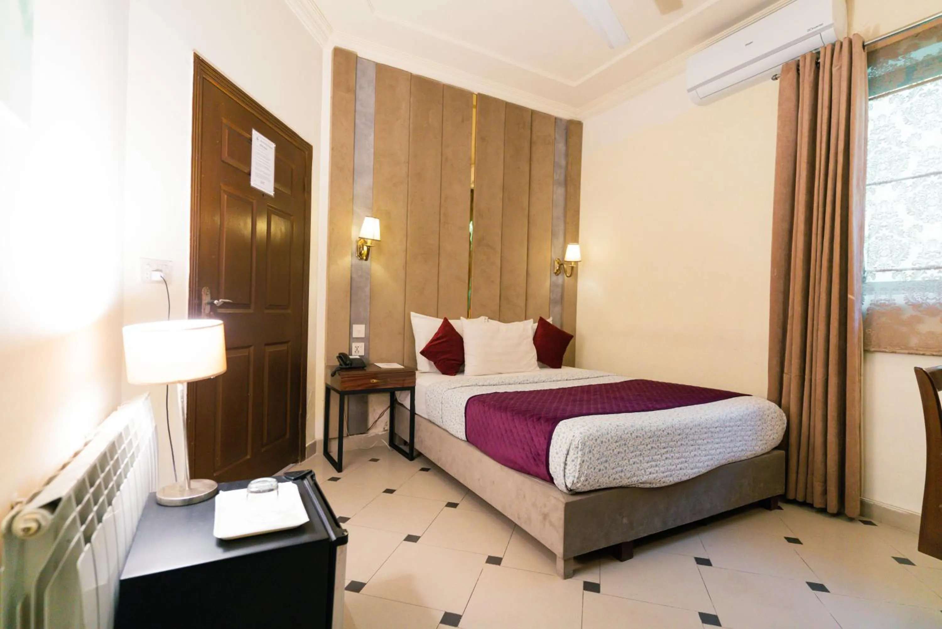 Bed in Shelton's Rezidor Islamabad