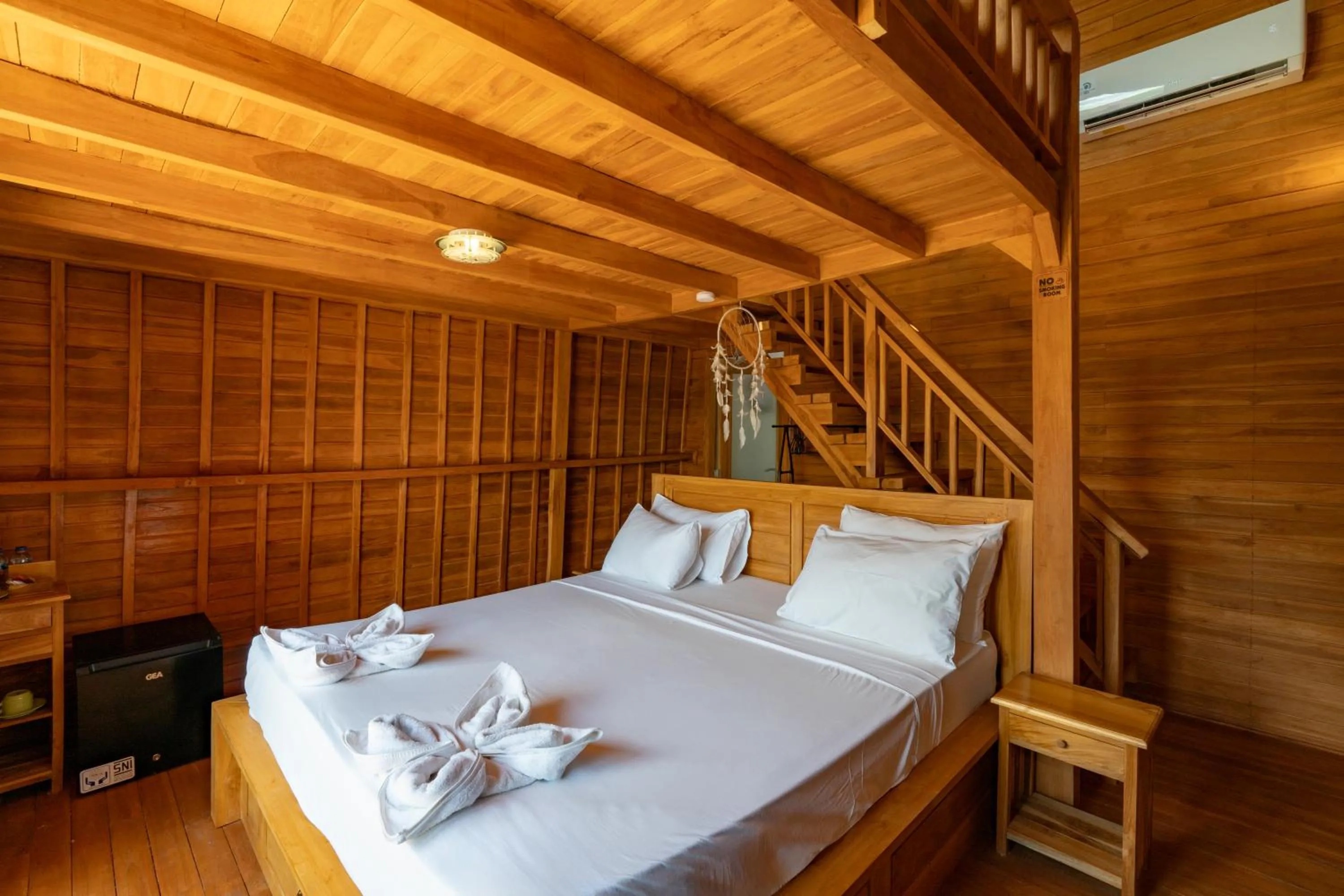 Bed in Butterfly Villas Nusa Ceningan