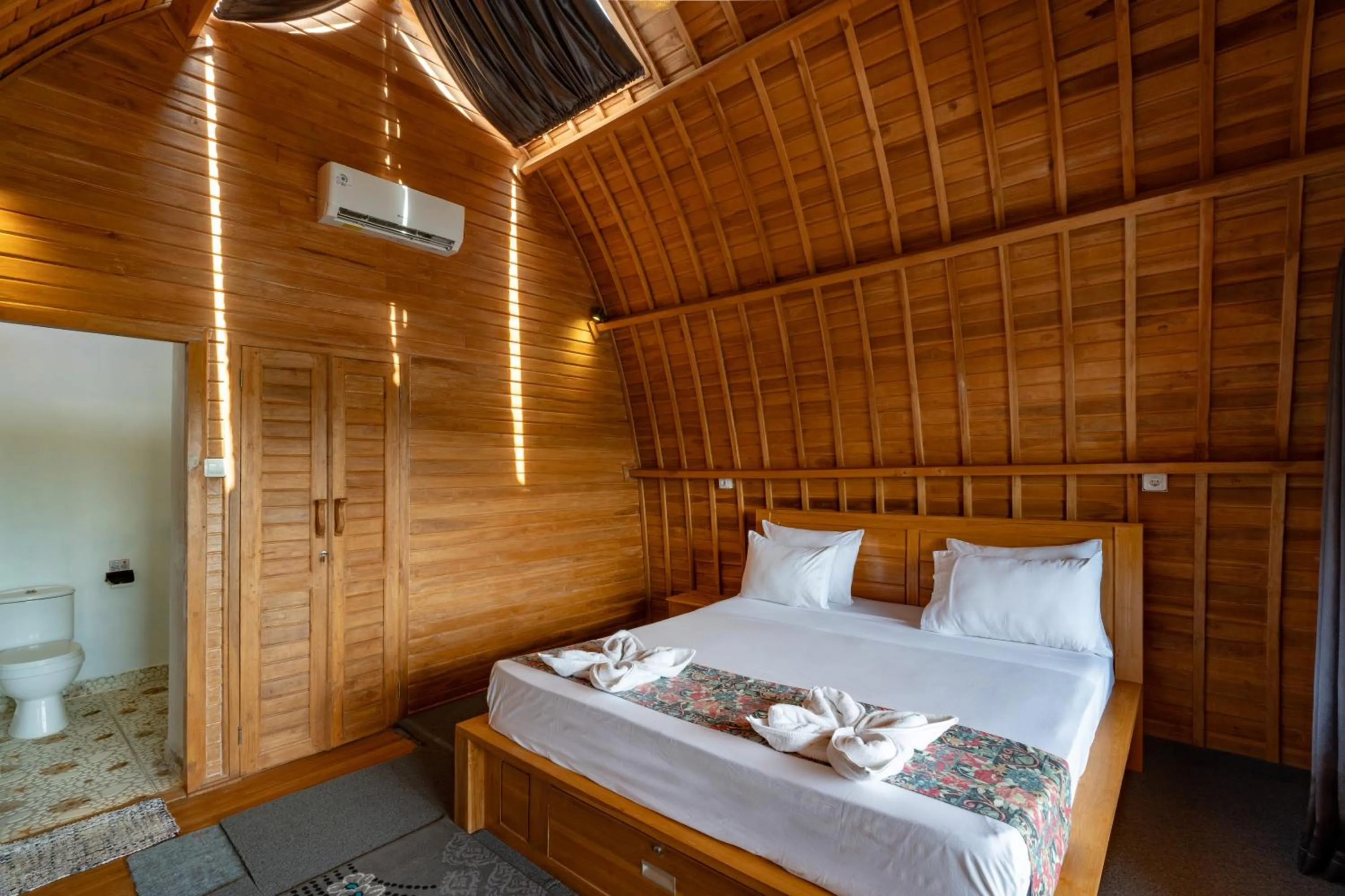 Bed in Butterfly Villas Nusa Ceningan