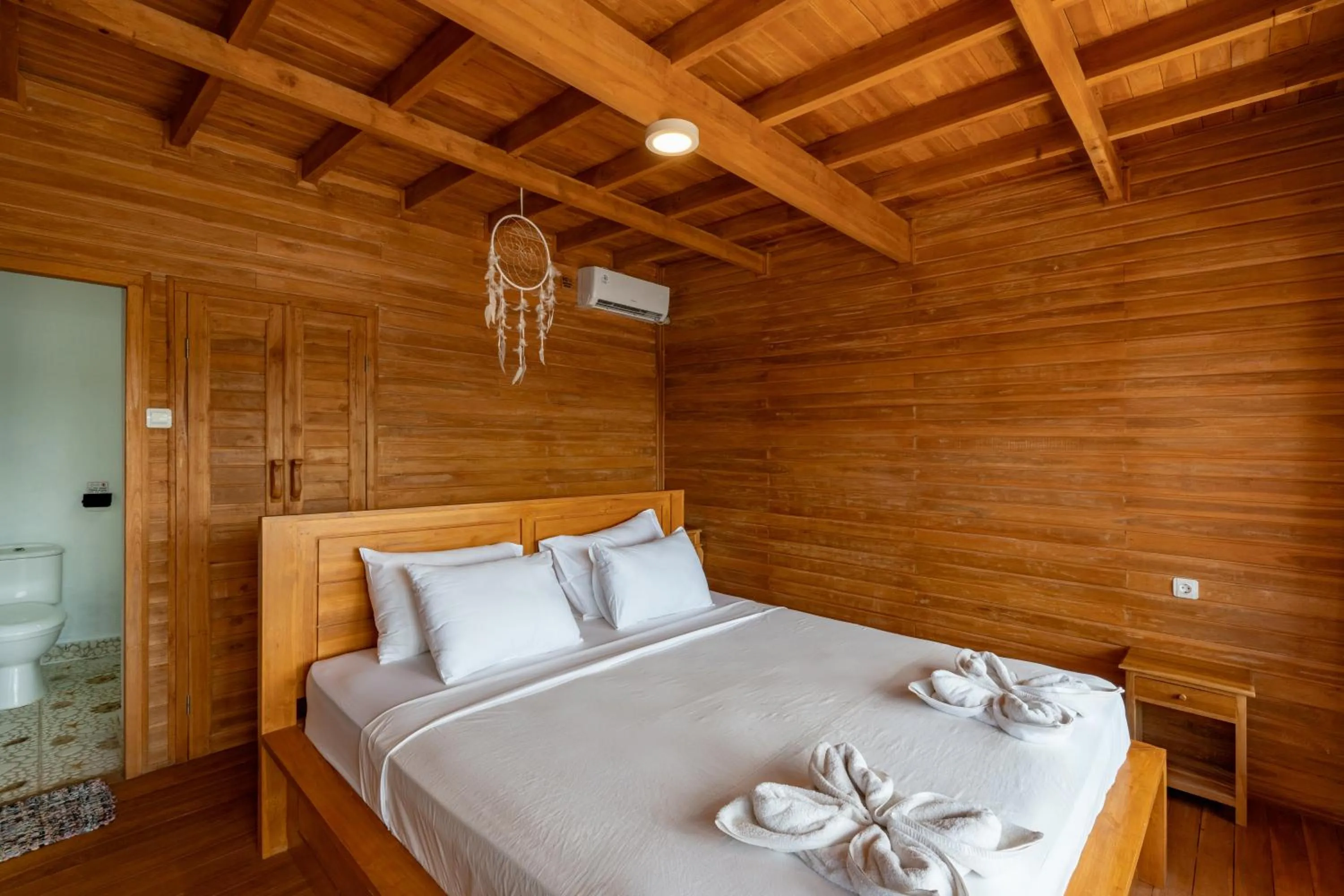 Bed in Butterfly Villas Nusa Ceningan
