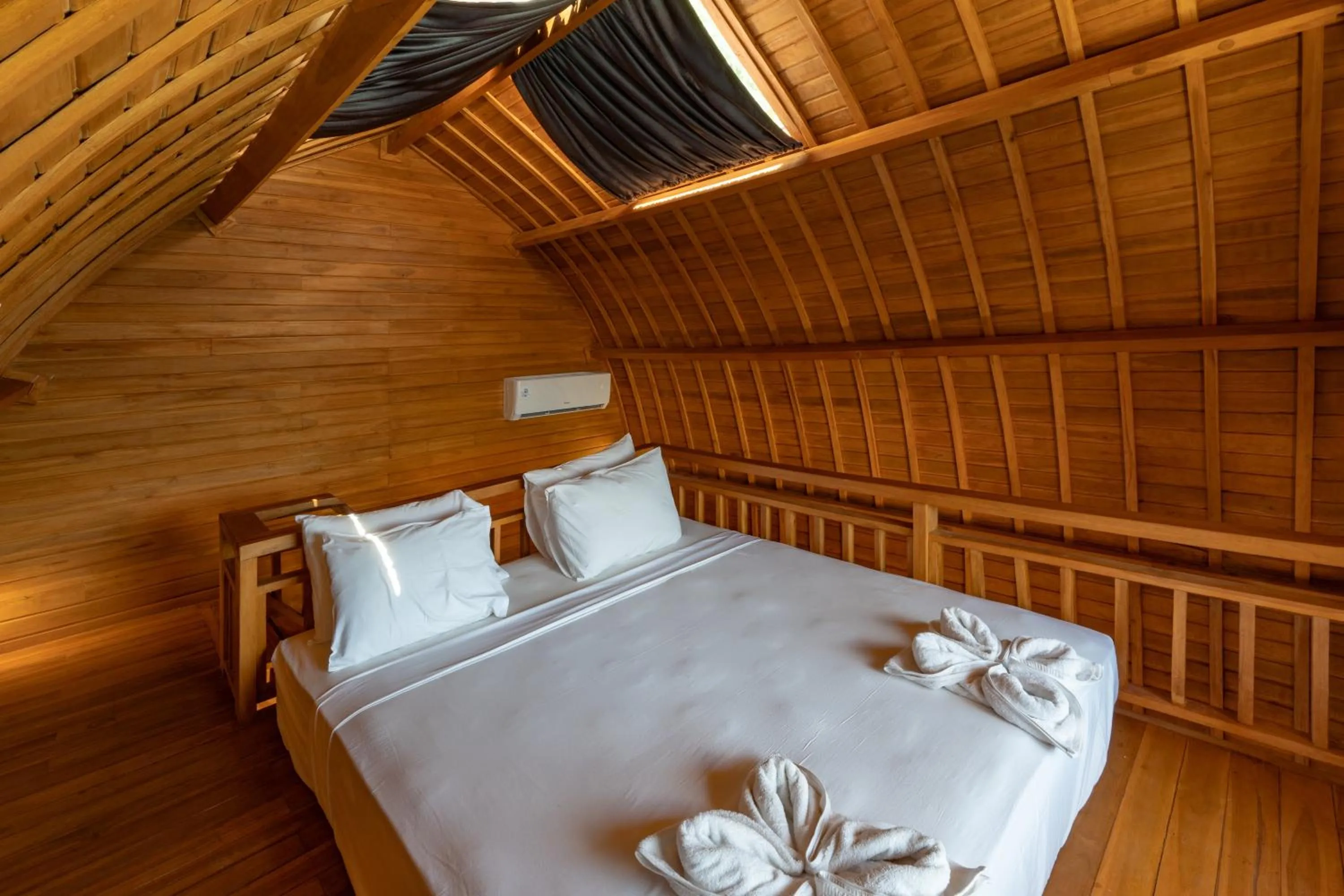 Bed in Butterfly Villas Nusa Ceningan