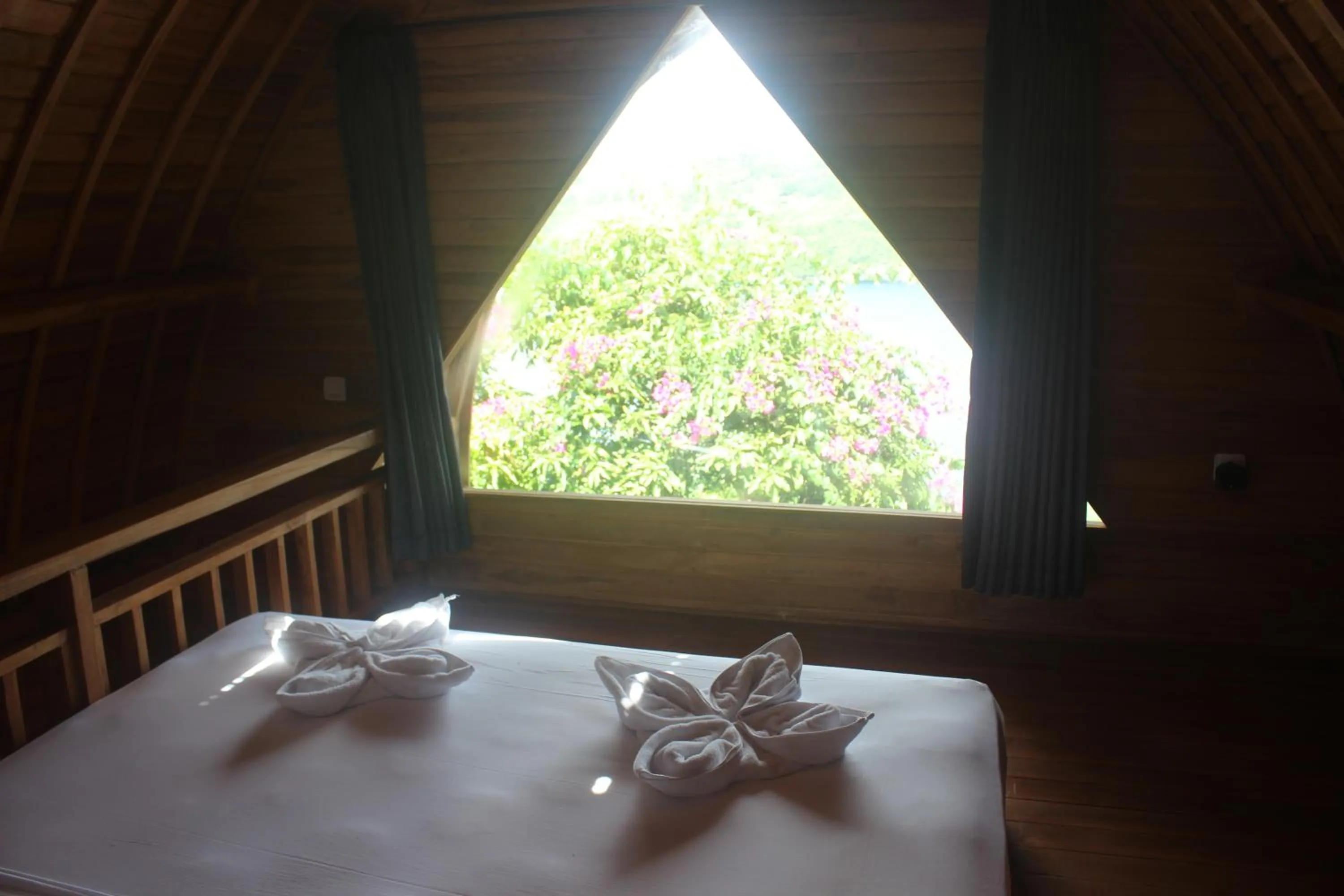 Bed in Butterfly Villas Nusa Ceningan