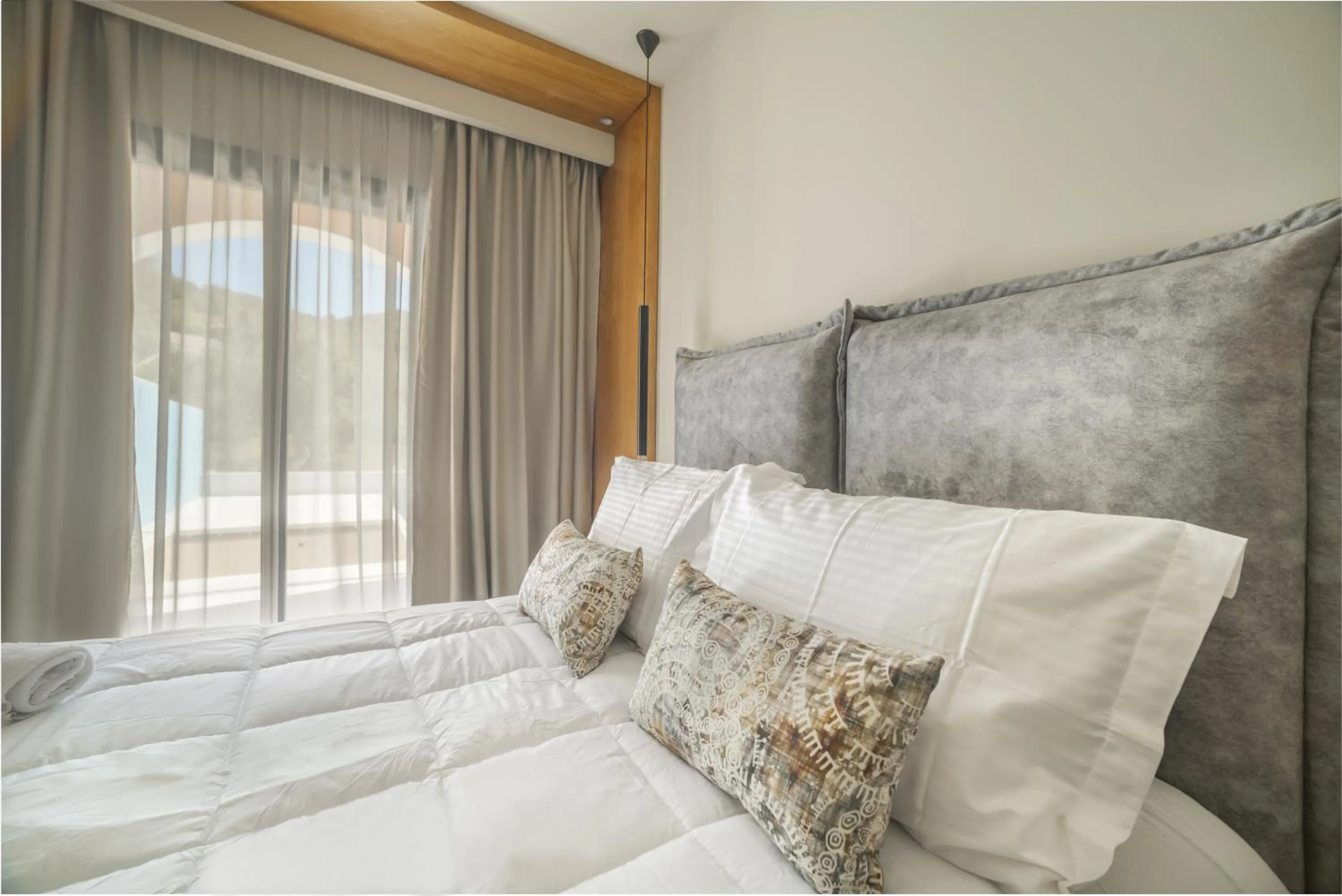 Bed in Nikon Boutique Hotel