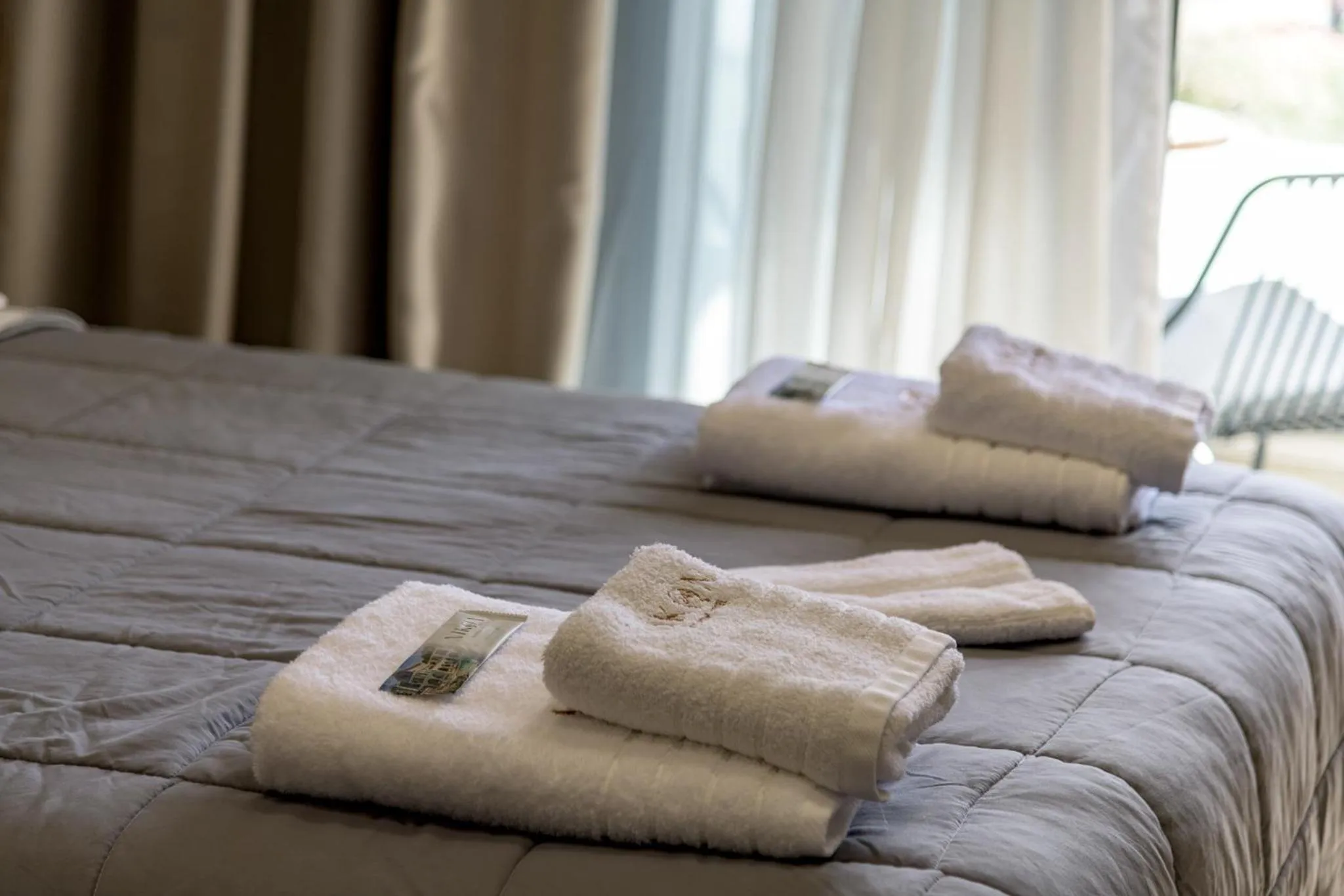 Bed in Nikon Boutique Hotel