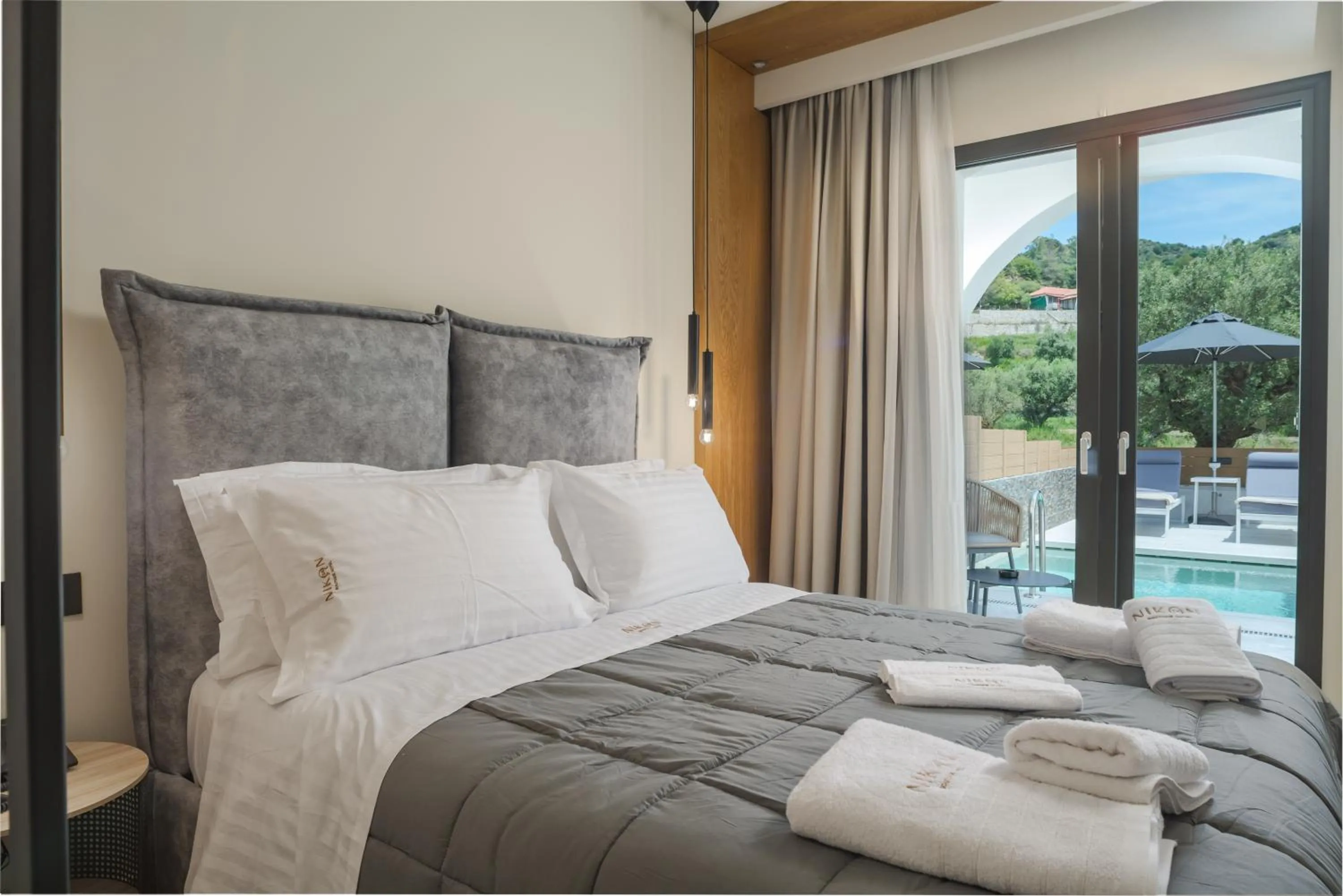 Bed in Nikon Boutique Hotel