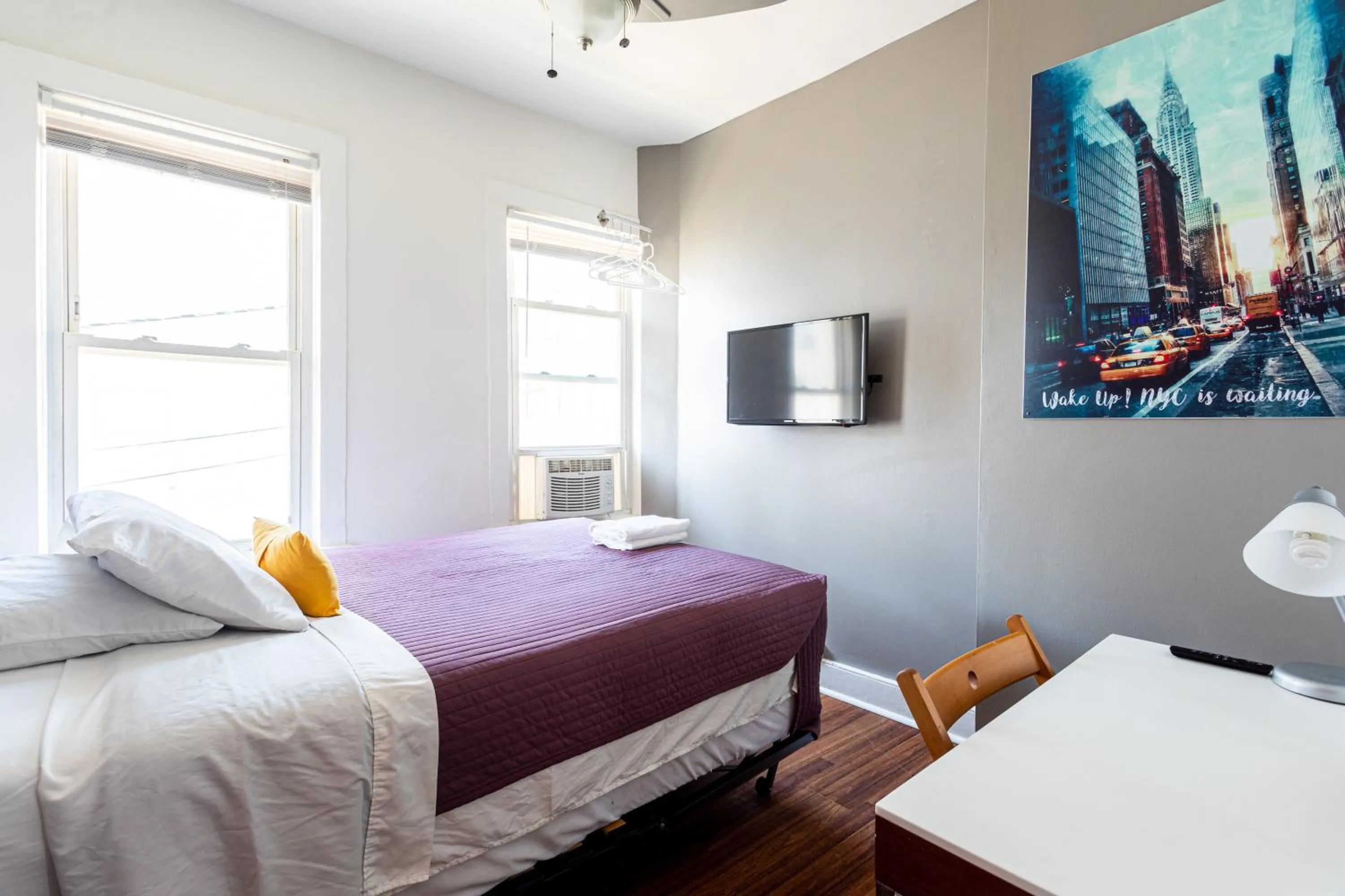 Photo of the whole room, Bed in Best Room To Visit NYC-Subway Access