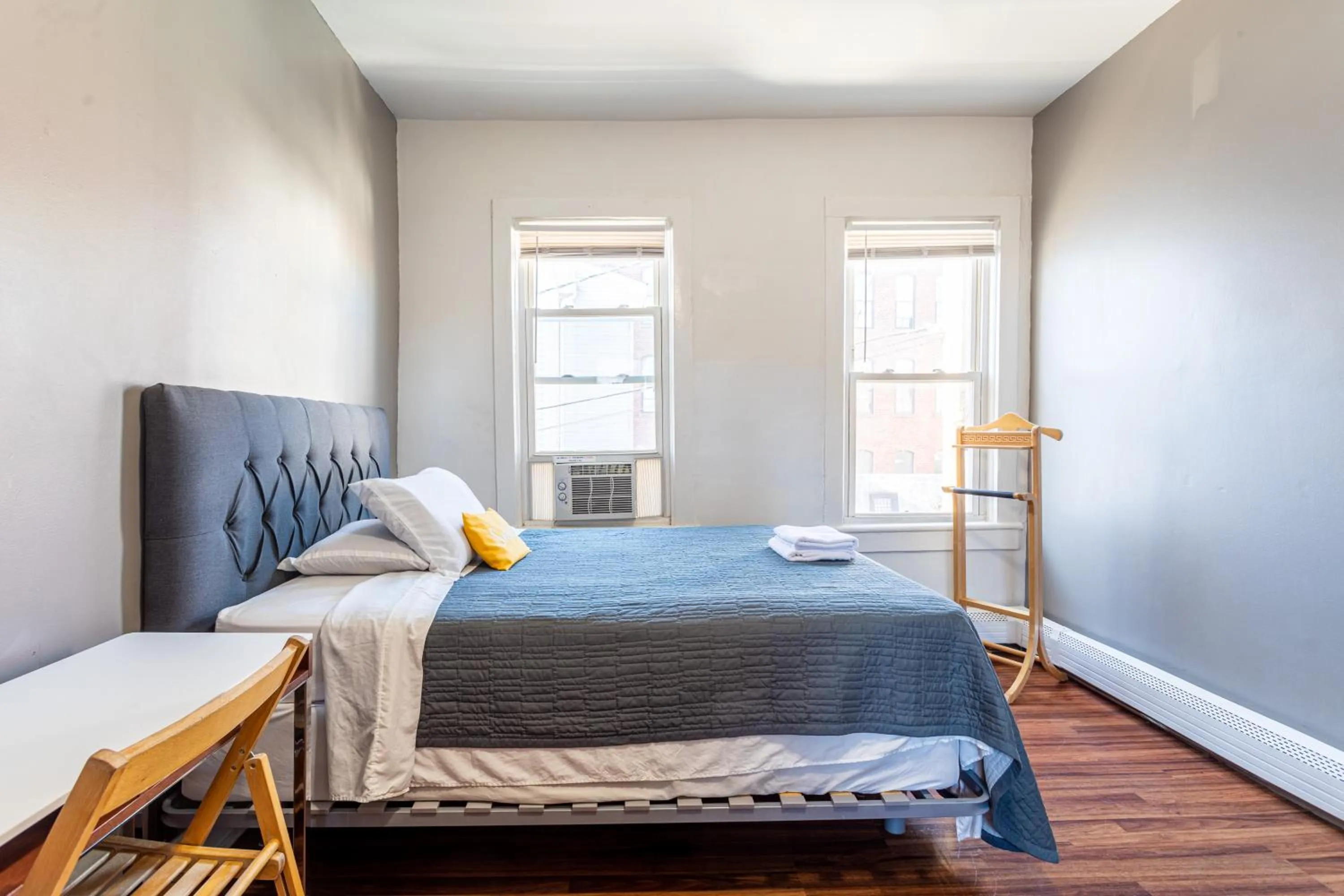 Photo of the whole room, Bed in Best Room To Visit NYC-Subway Access