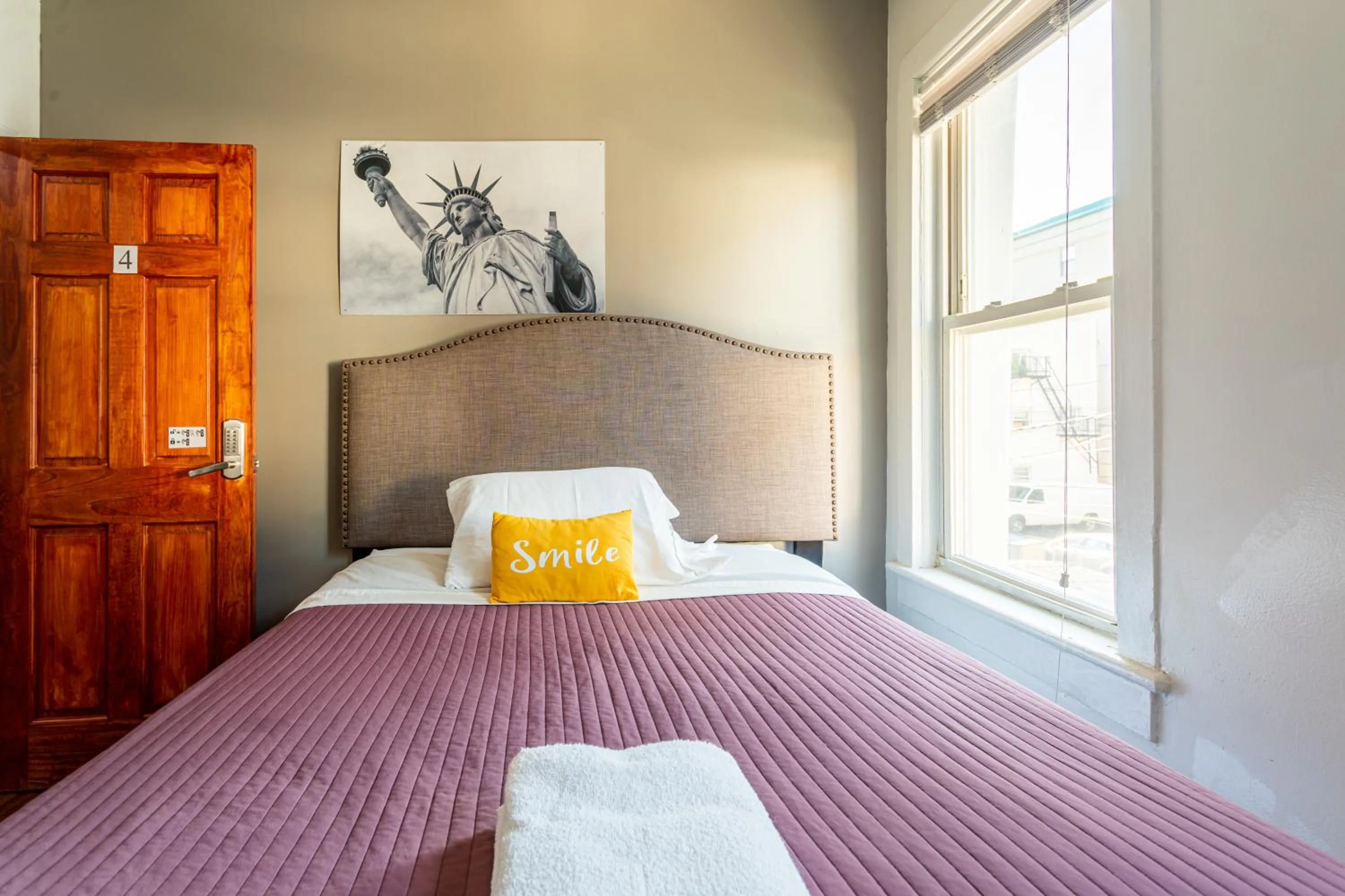 Photo of the whole room, Bed in Best Room To Visit NYC-Subway Access