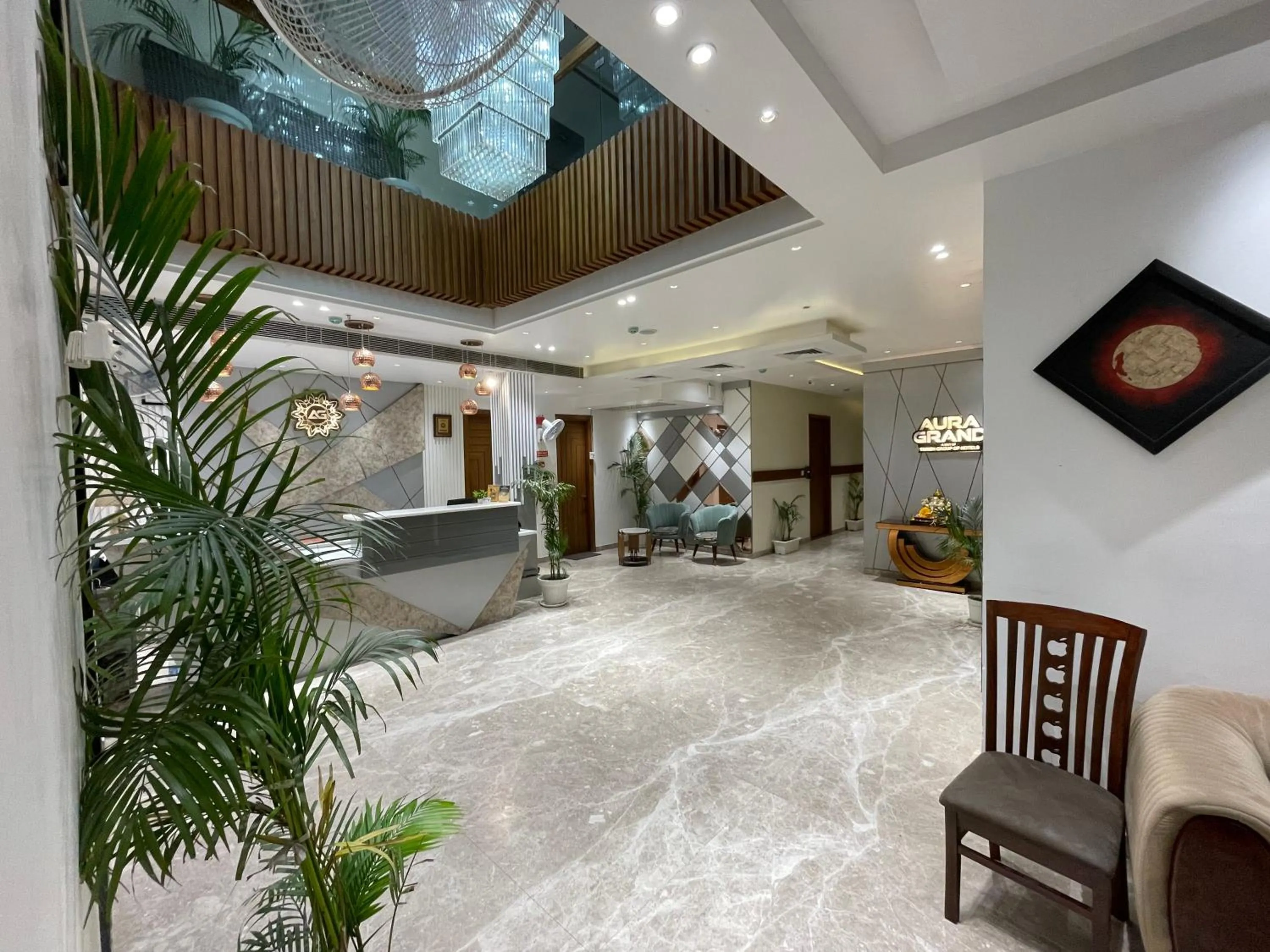 Lobby or reception in Hotel Aura Grand By Levelup Hotels