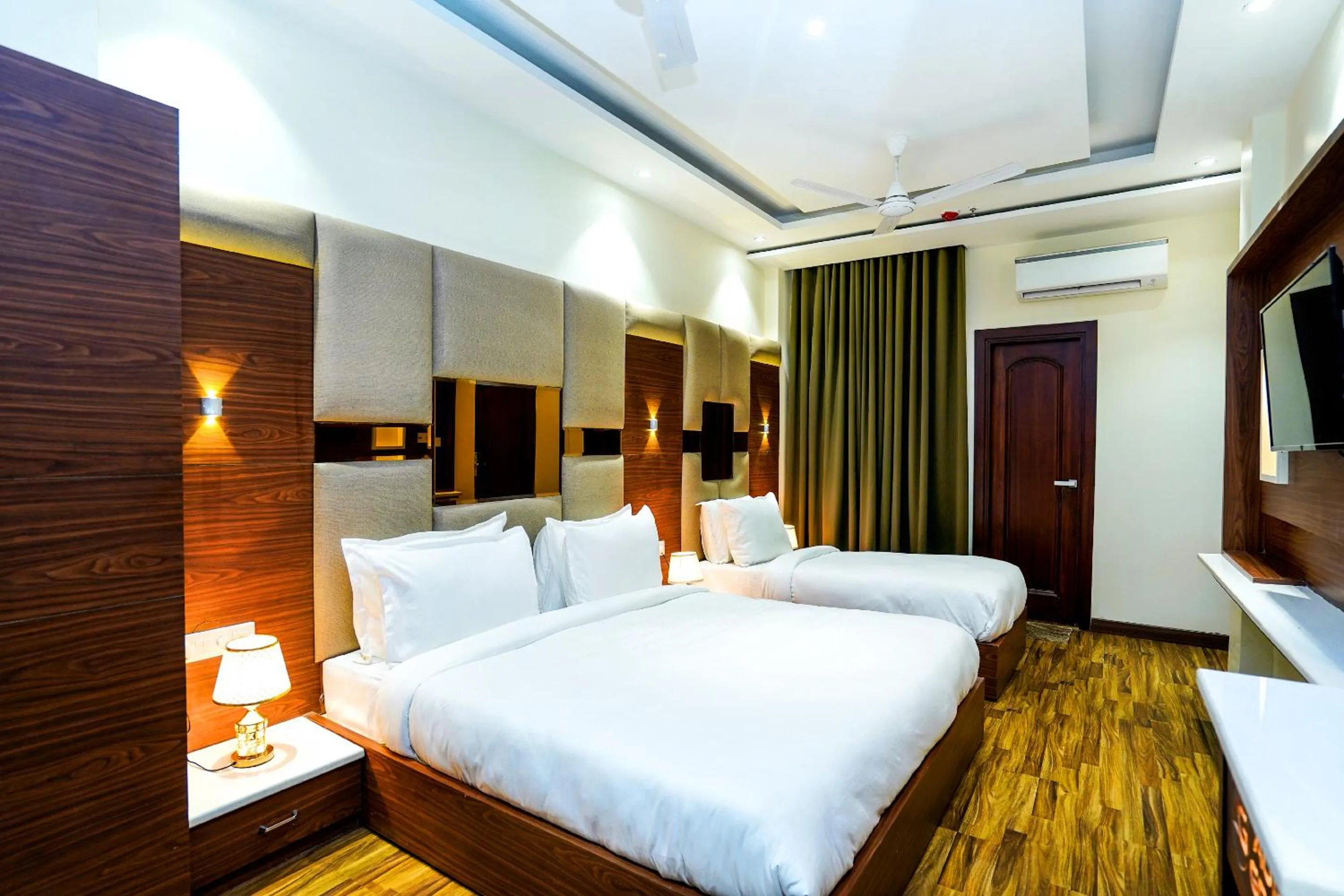 Photo of the whole room, Bed in Hotel Aura Grand By Levelup Hotels