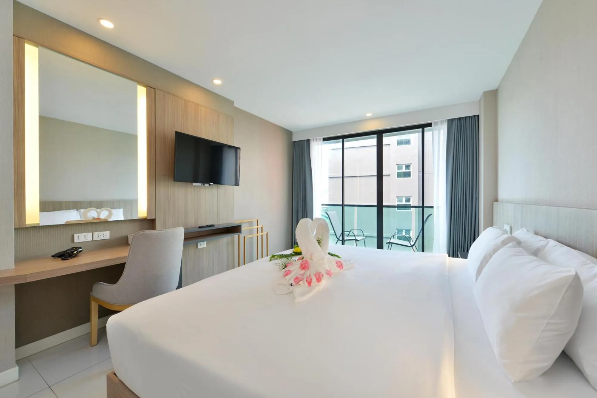 Bed in Grace Patong Hotel