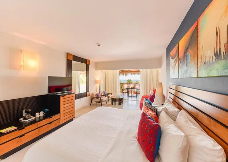 Bed in Grand Decameron Los Cabos, A Trademark All-Inclusive Resort