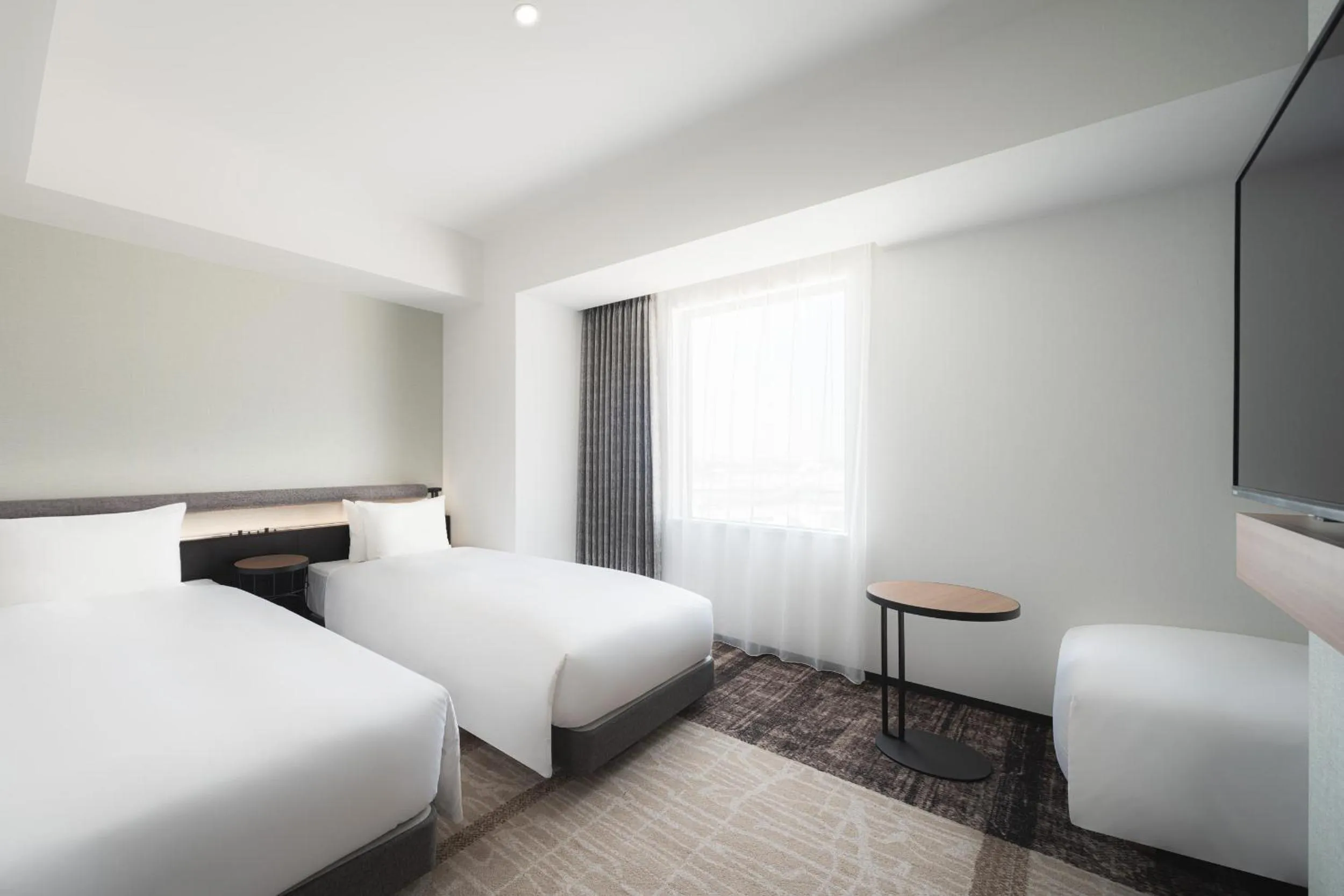 Photo of the whole room, Bed in Nest Hotel Naha Nishi