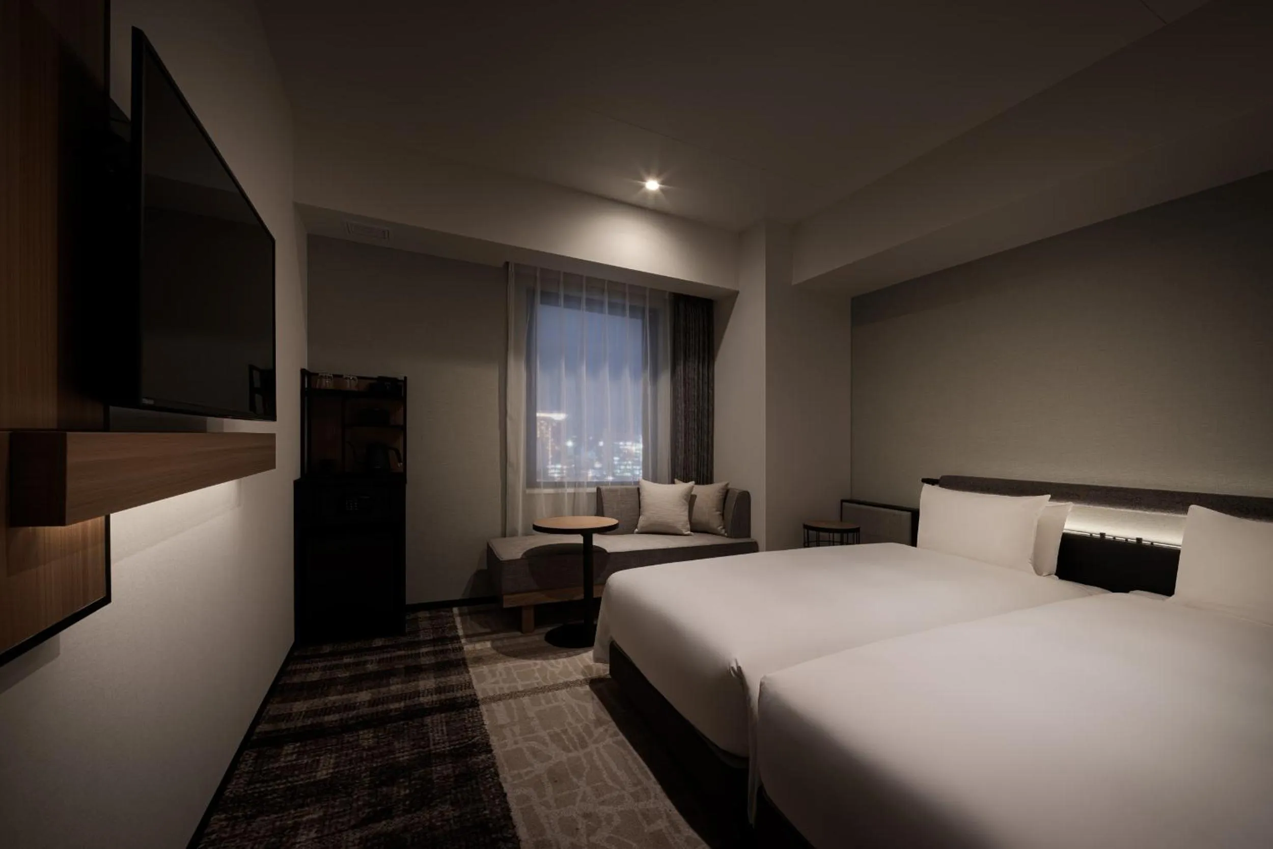 Photo of the whole room, Bed in Nest Hotel Naha Nishi