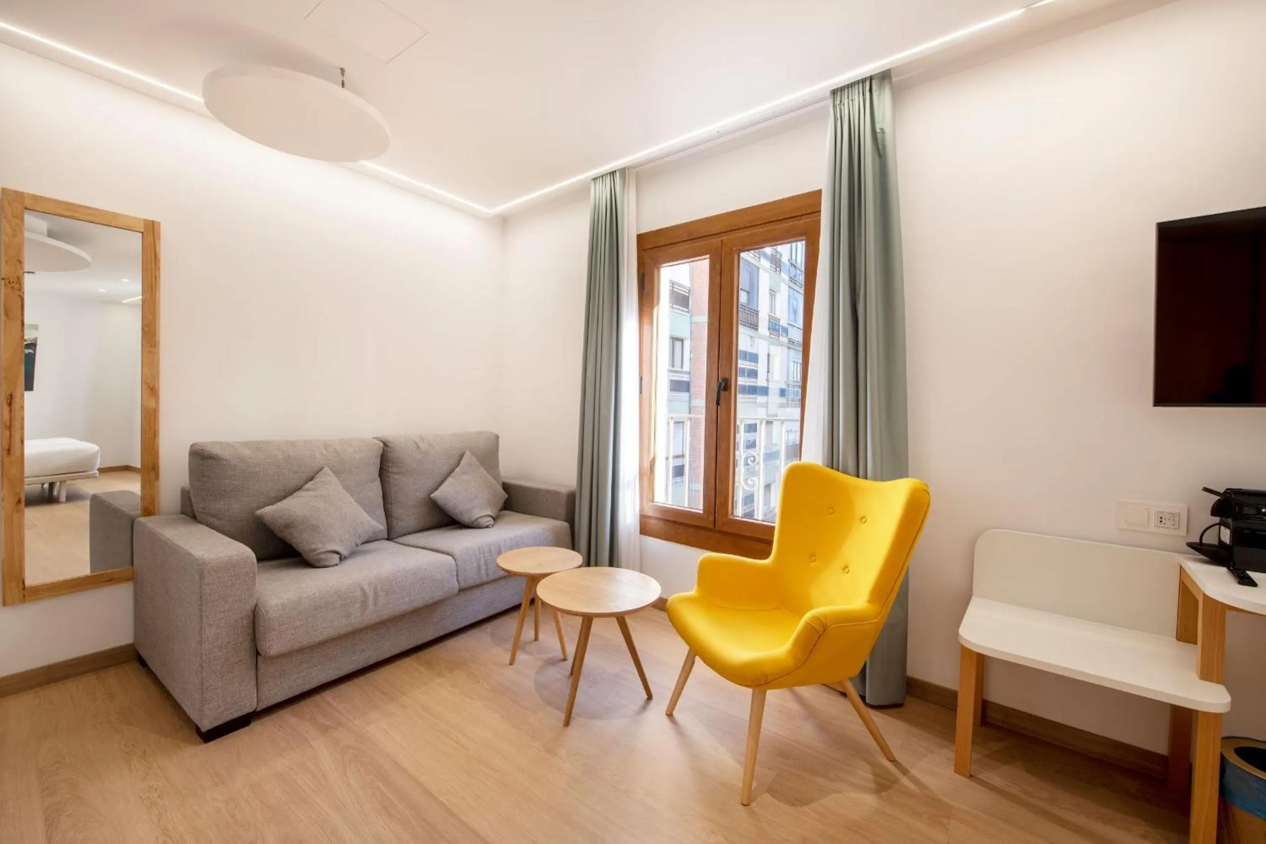 Seating area in Odyssey Rooms Alicante