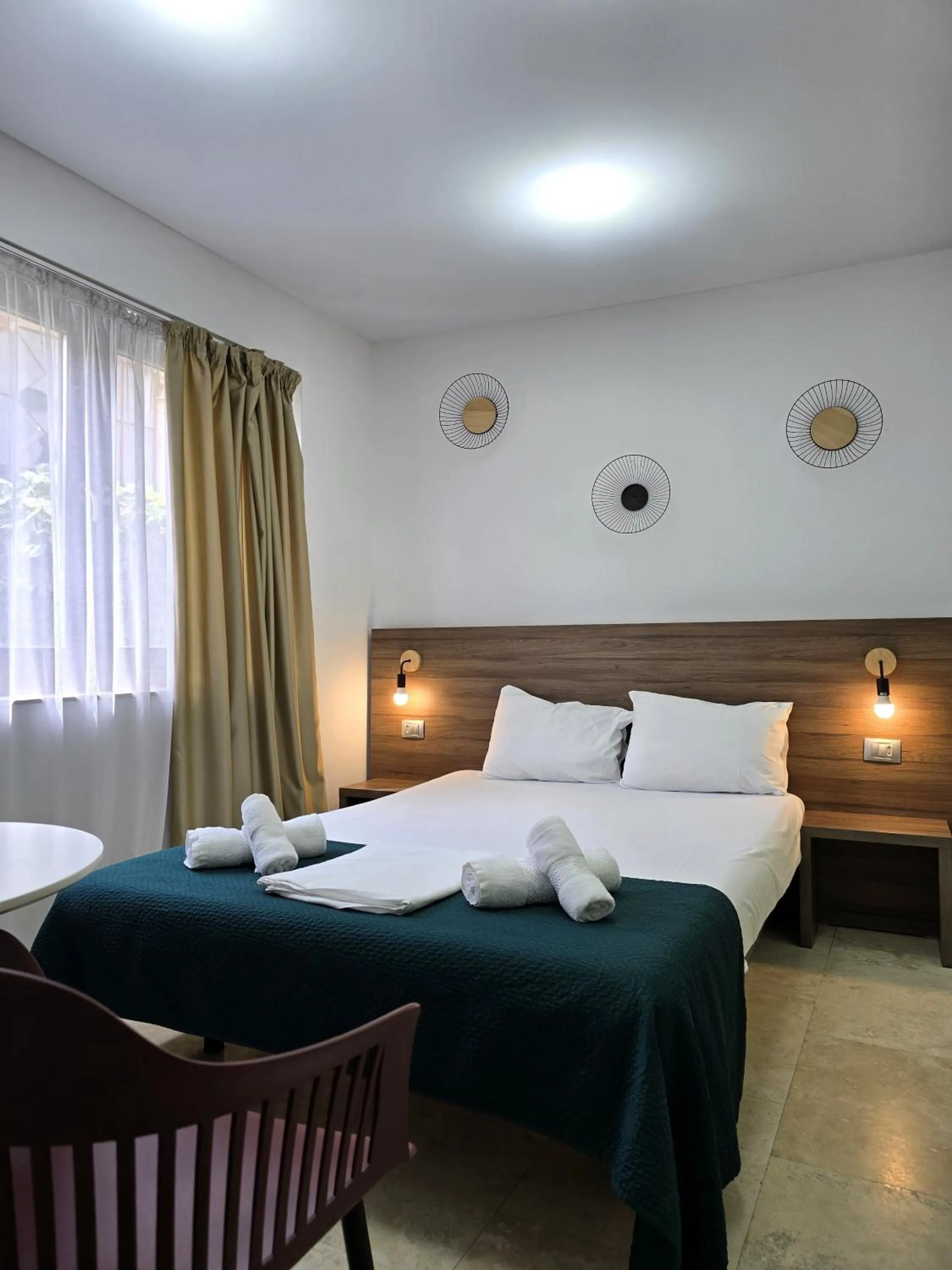 Bed in Dacia Residence Apartments