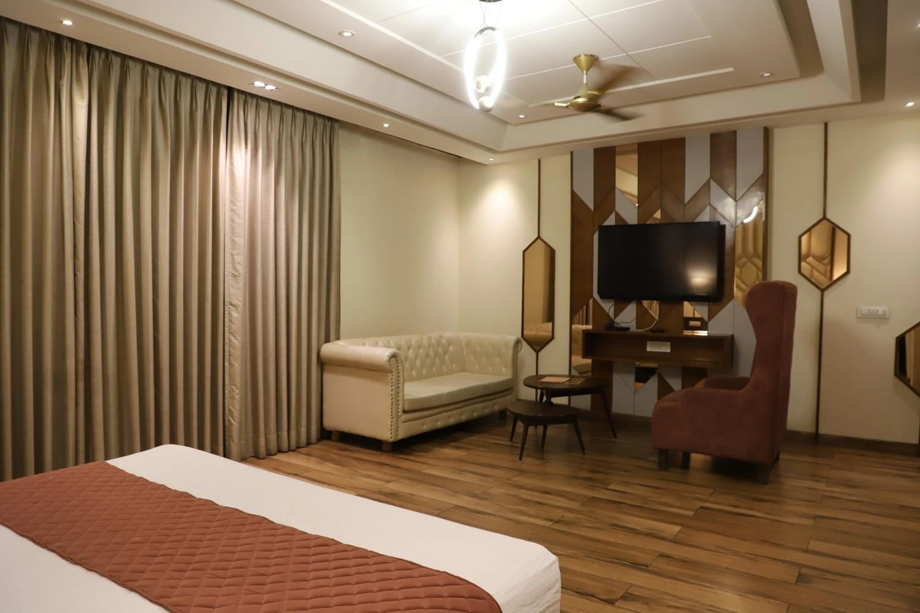 Seating area, Bed in Hotel West End View A Unit of Hotel SC Residency