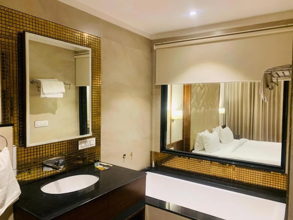 Bathroom, Bed in Hotel West End View A Unit of Hotel SC Residency