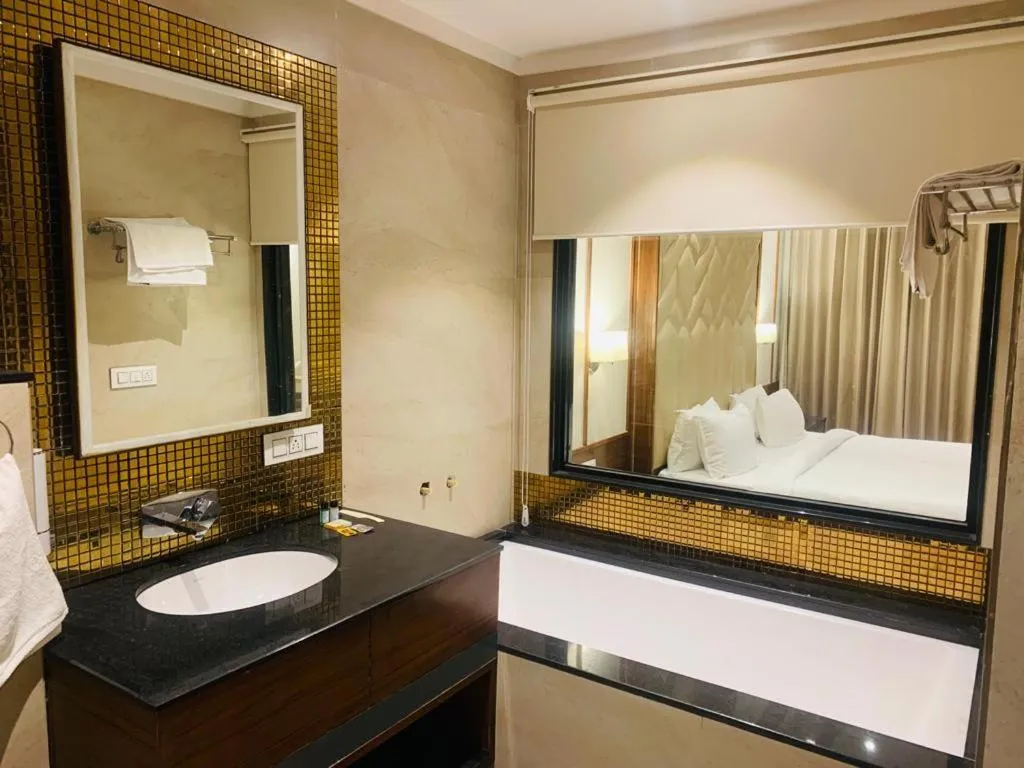 Bathroom, Bed in Hotel West End View A Unit of Hotel SC Residency