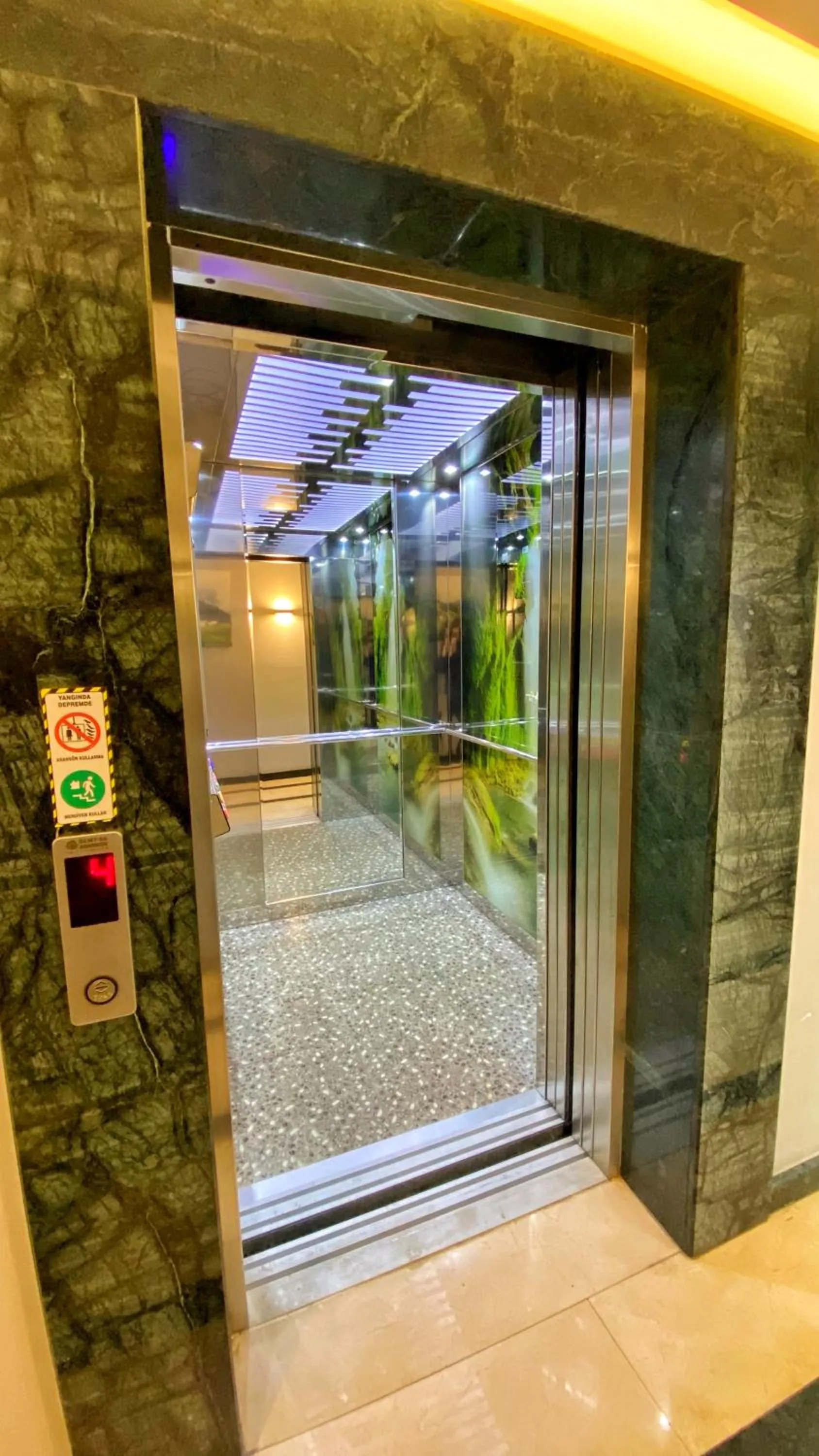 elevator in Heaven Suite Hotel