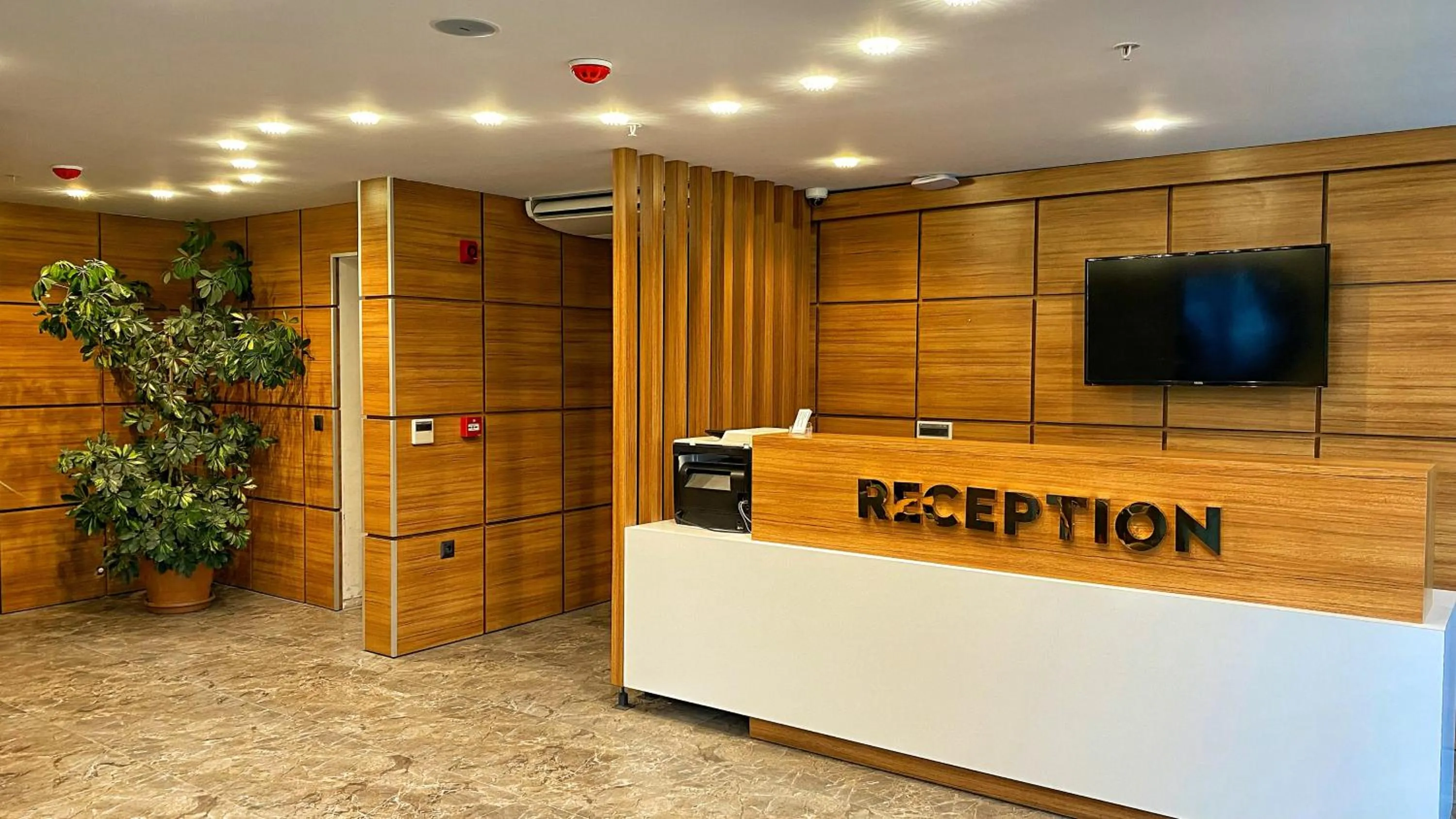 Lobby or reception in Heaven Suite Hotel