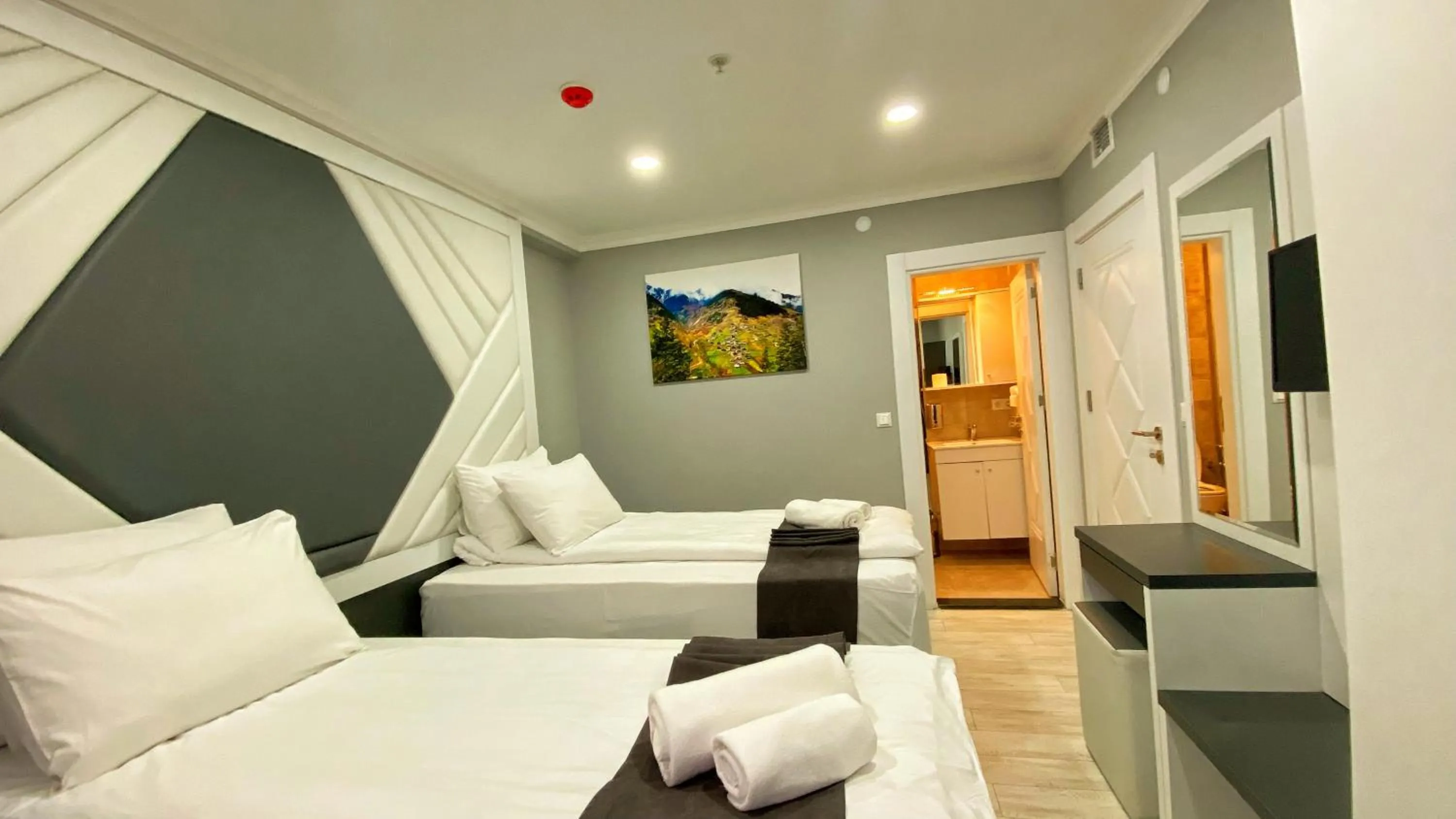 Bedroom, Bed in Heaven Suite Hotel