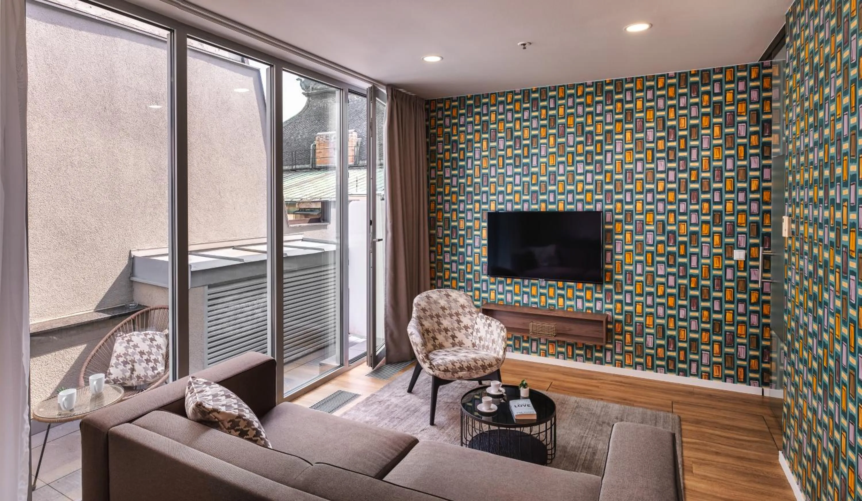 TV and multimedia in VN17 Rooftop Suites by Adrez