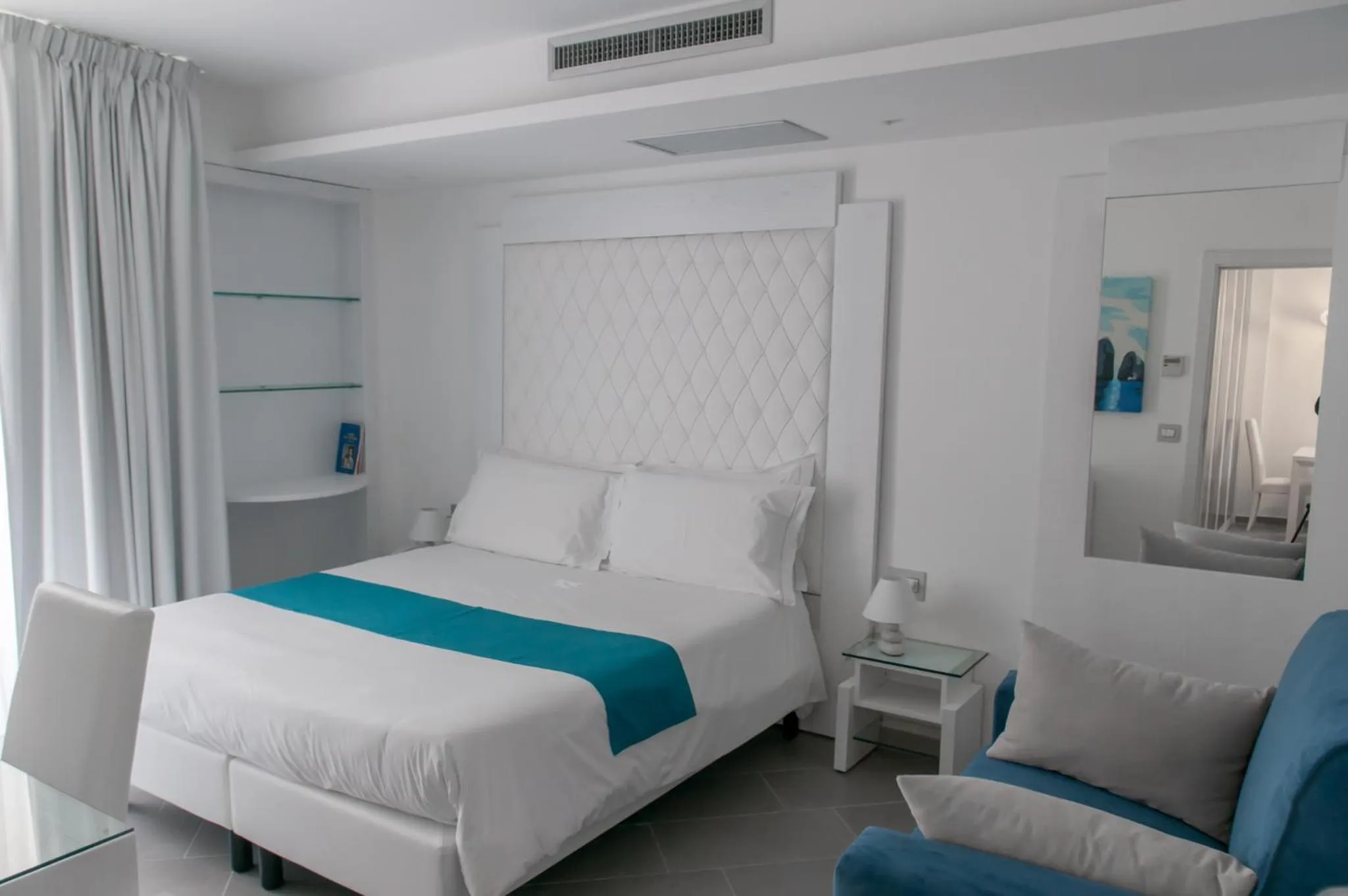 Bedroom, Bed in Hotel Tasso Suites & Spa