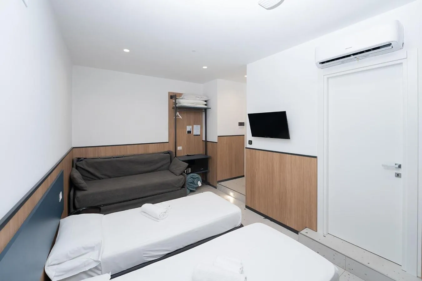 Bed in Mia Suites Hotel Bella Capri