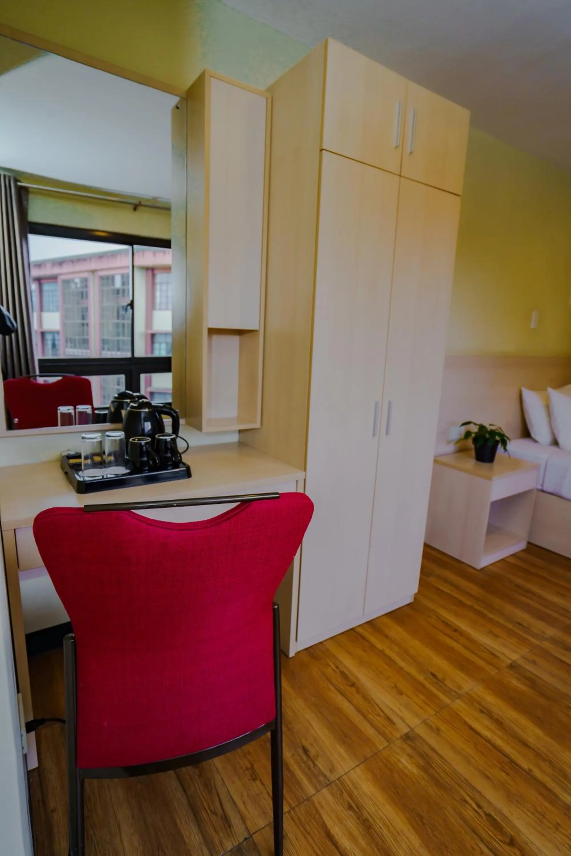 Seating area, Bed in Olive Town Center and Hotel