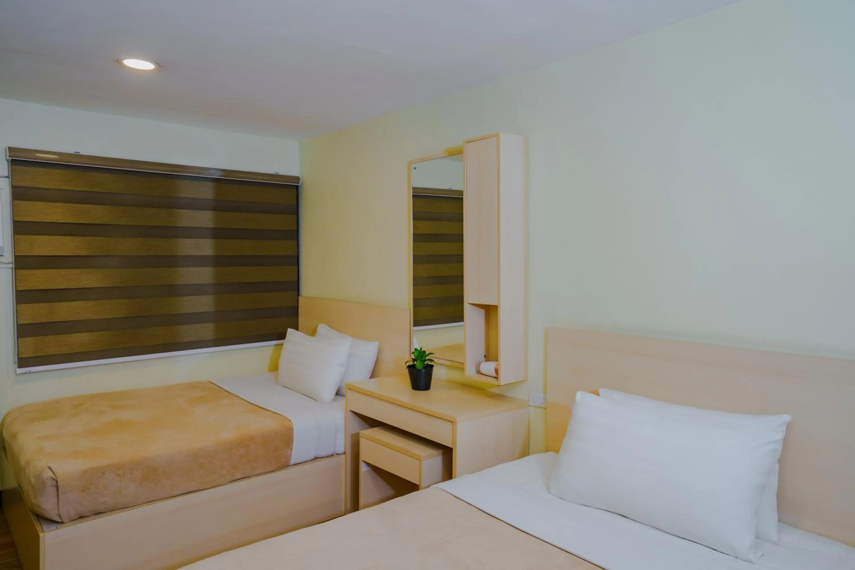 Bedroom, Bed in Olive Town Center and Hotel