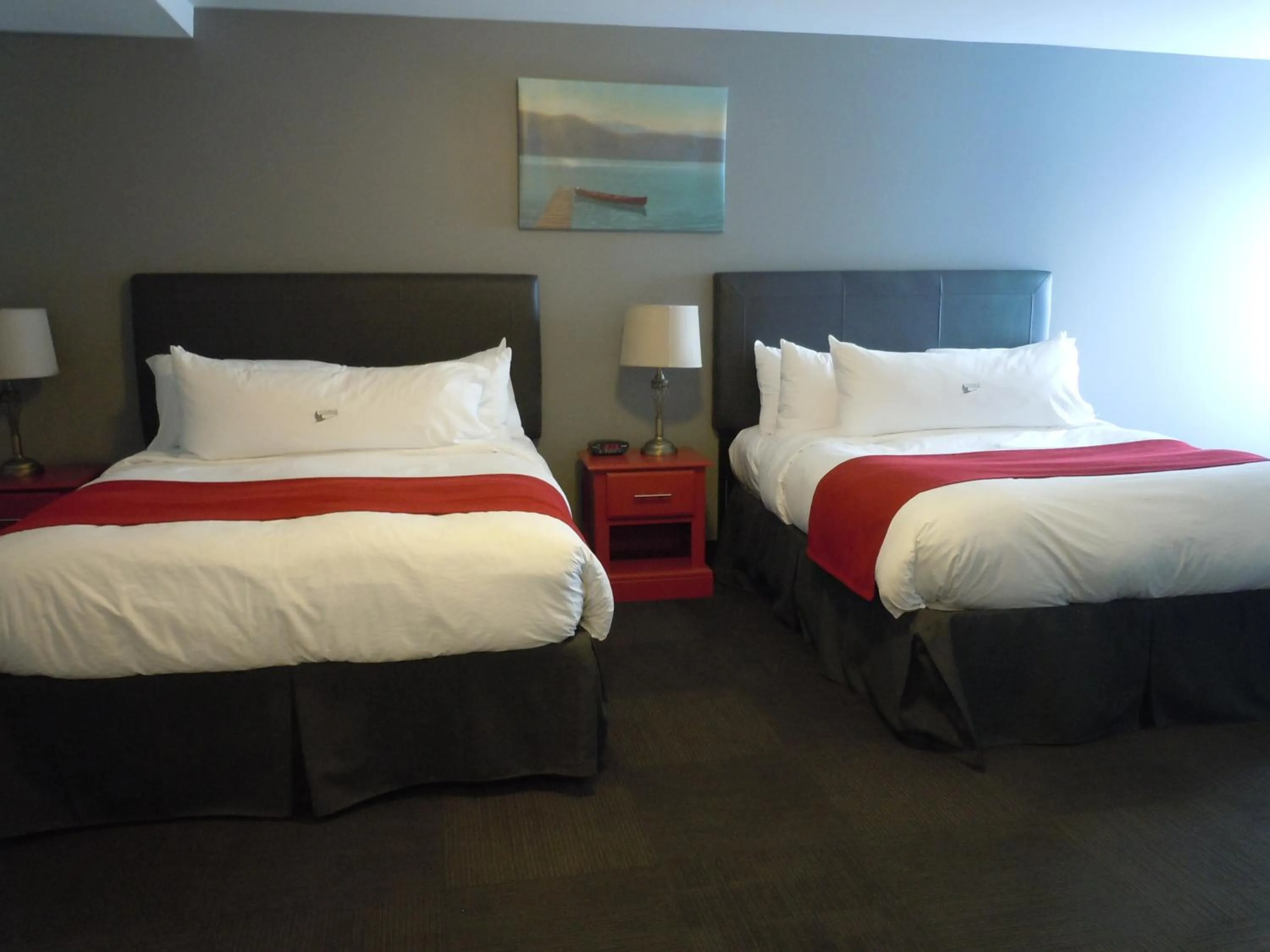 Bed in L'Auberge Du Lac St-Pierre